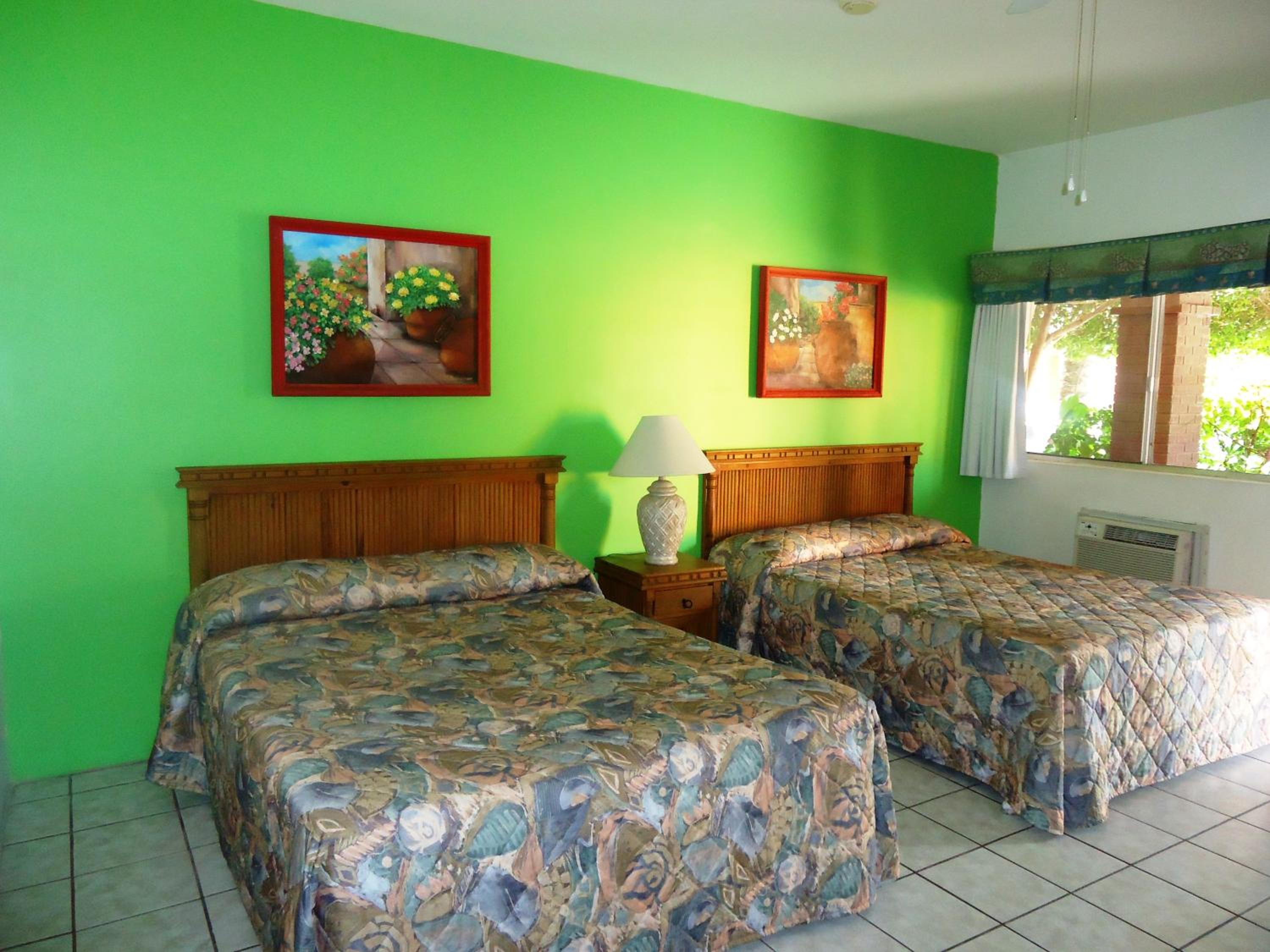 Queen Room with Two Queen Beds - Photo 10