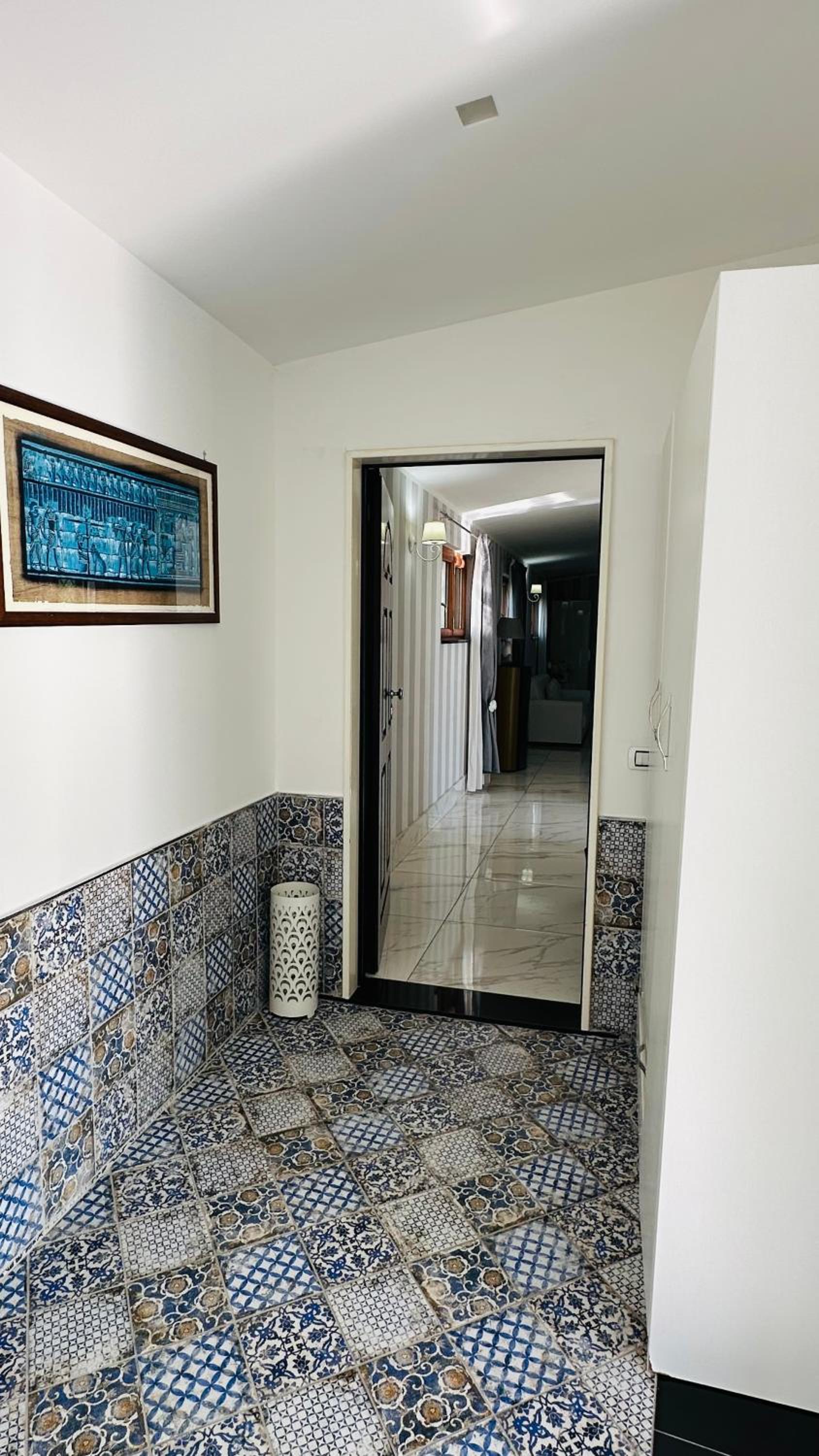 Three-Bedroom House - Photo 15