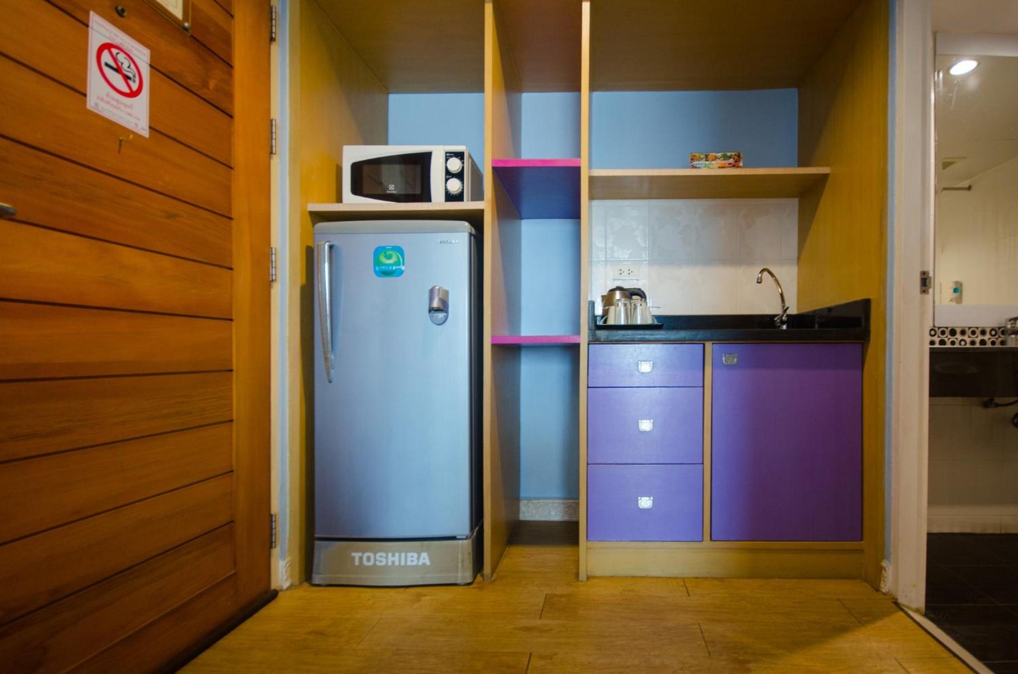 Deluxe Twin Queen Room - Photo 3