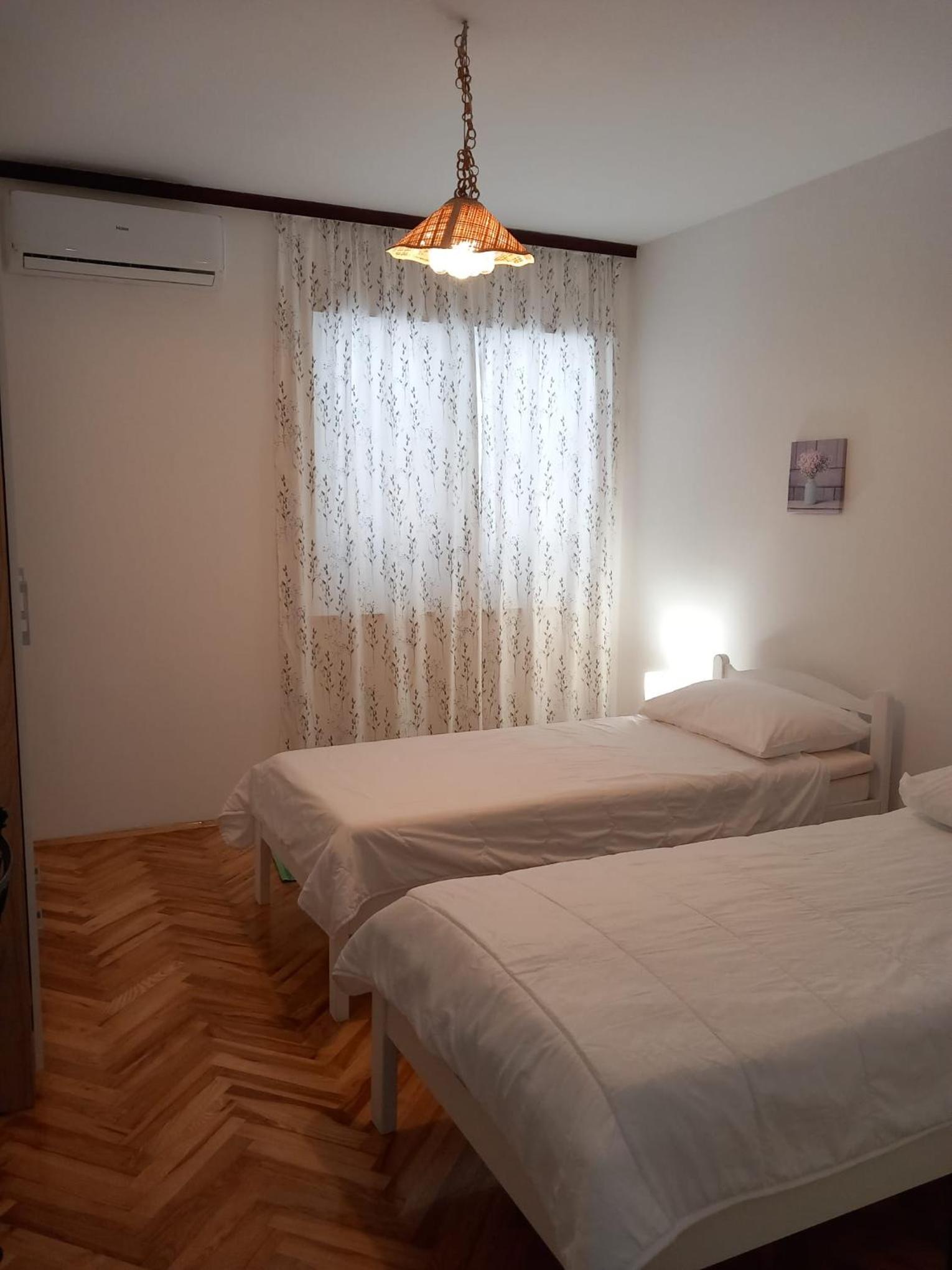 Three-Bedroom Apartment - Photo 20