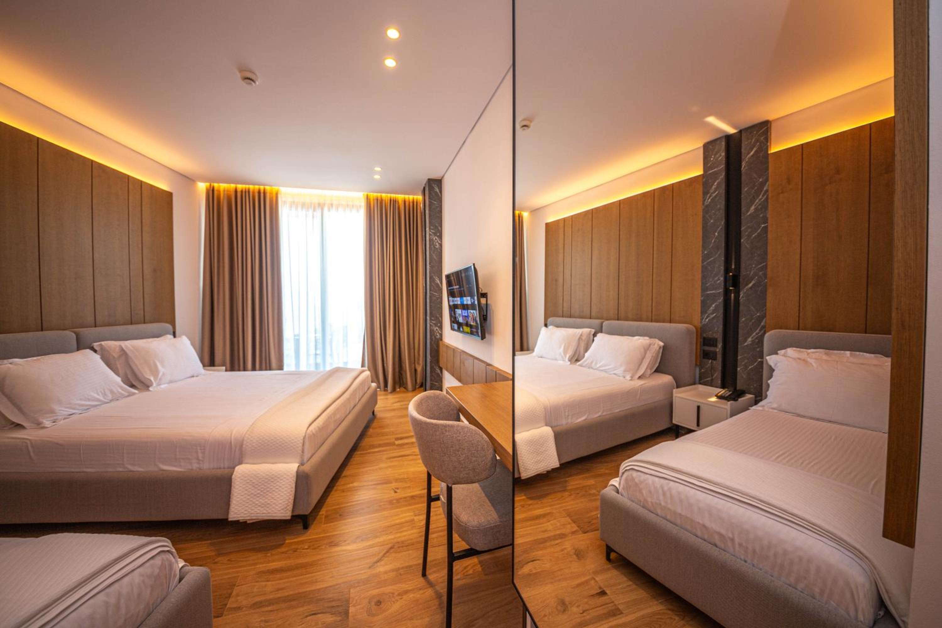 Deluxe Triple Room with Balcony and Sea View