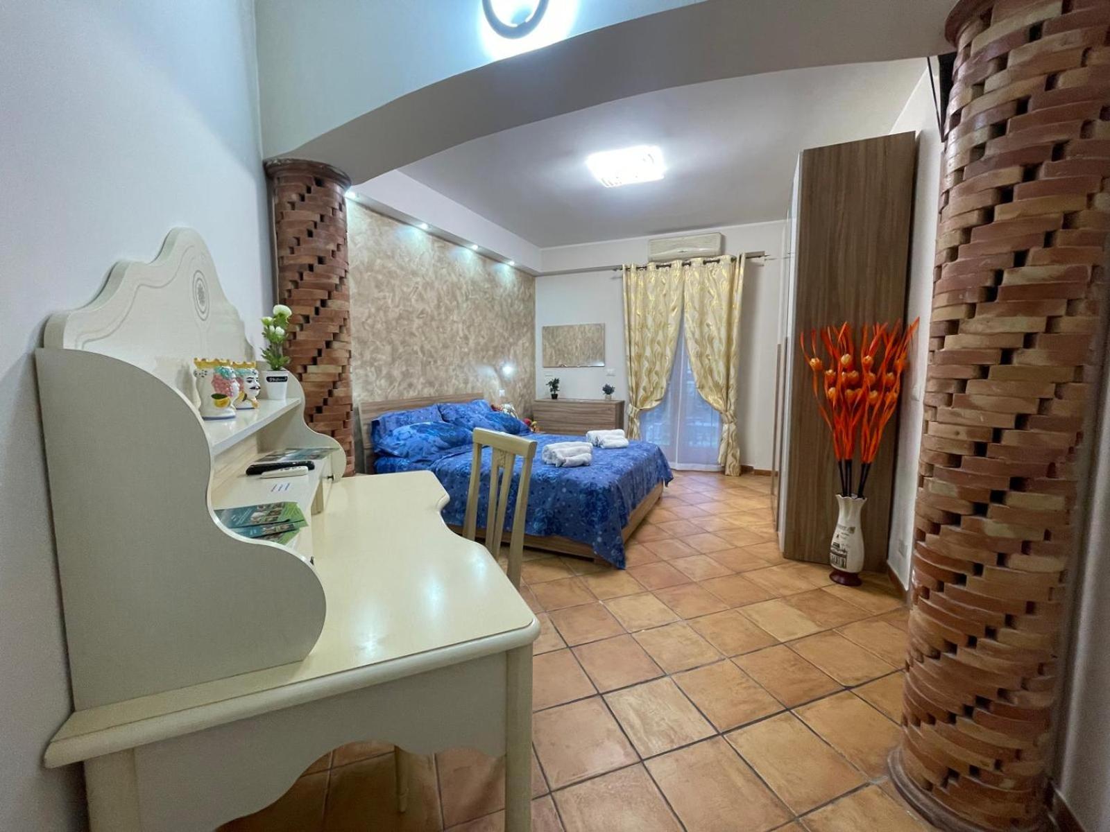 Quadruple Room with Private Bathroom