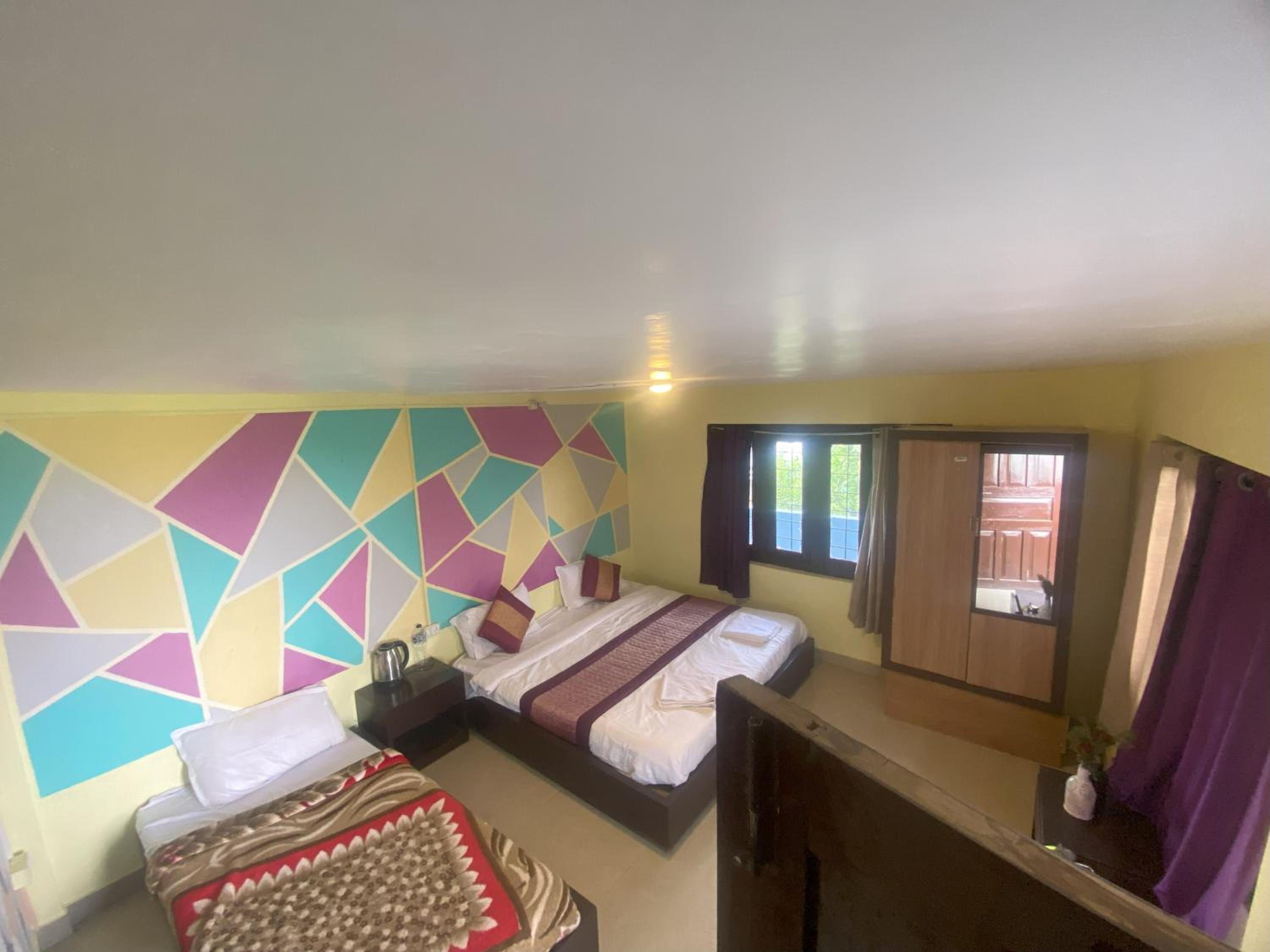 Basic Triple Room With Shared Bathroom photo 1