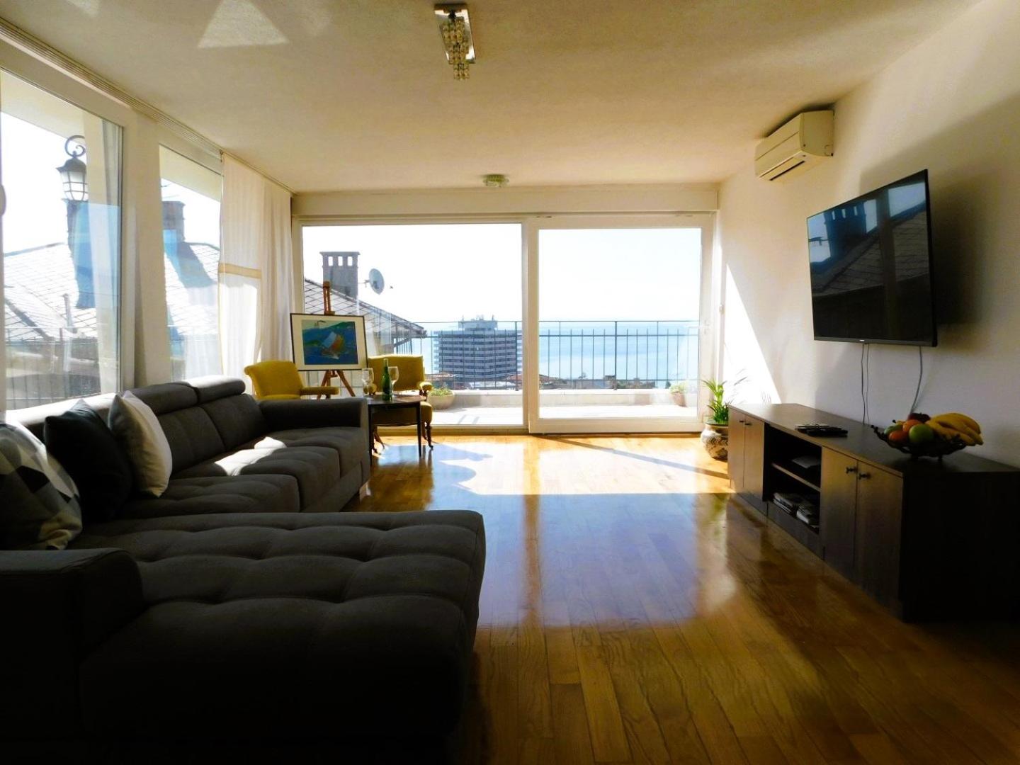 Three-Bedroom Apartment with Sea View