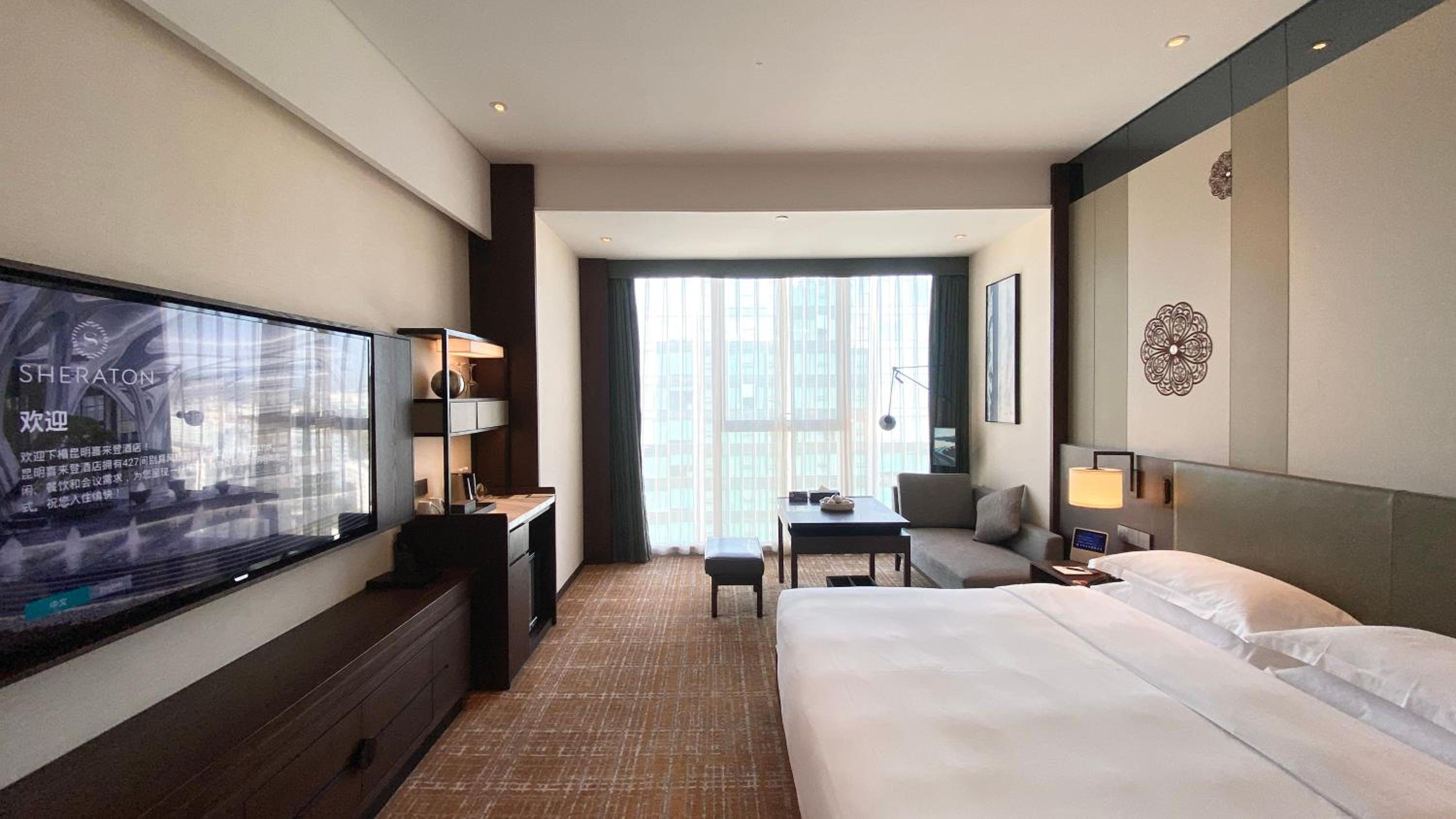 Deluxe King Bed Room with Guest Room with King Bed City view