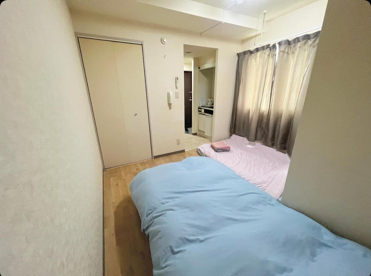 Economy Triple Room photo 2