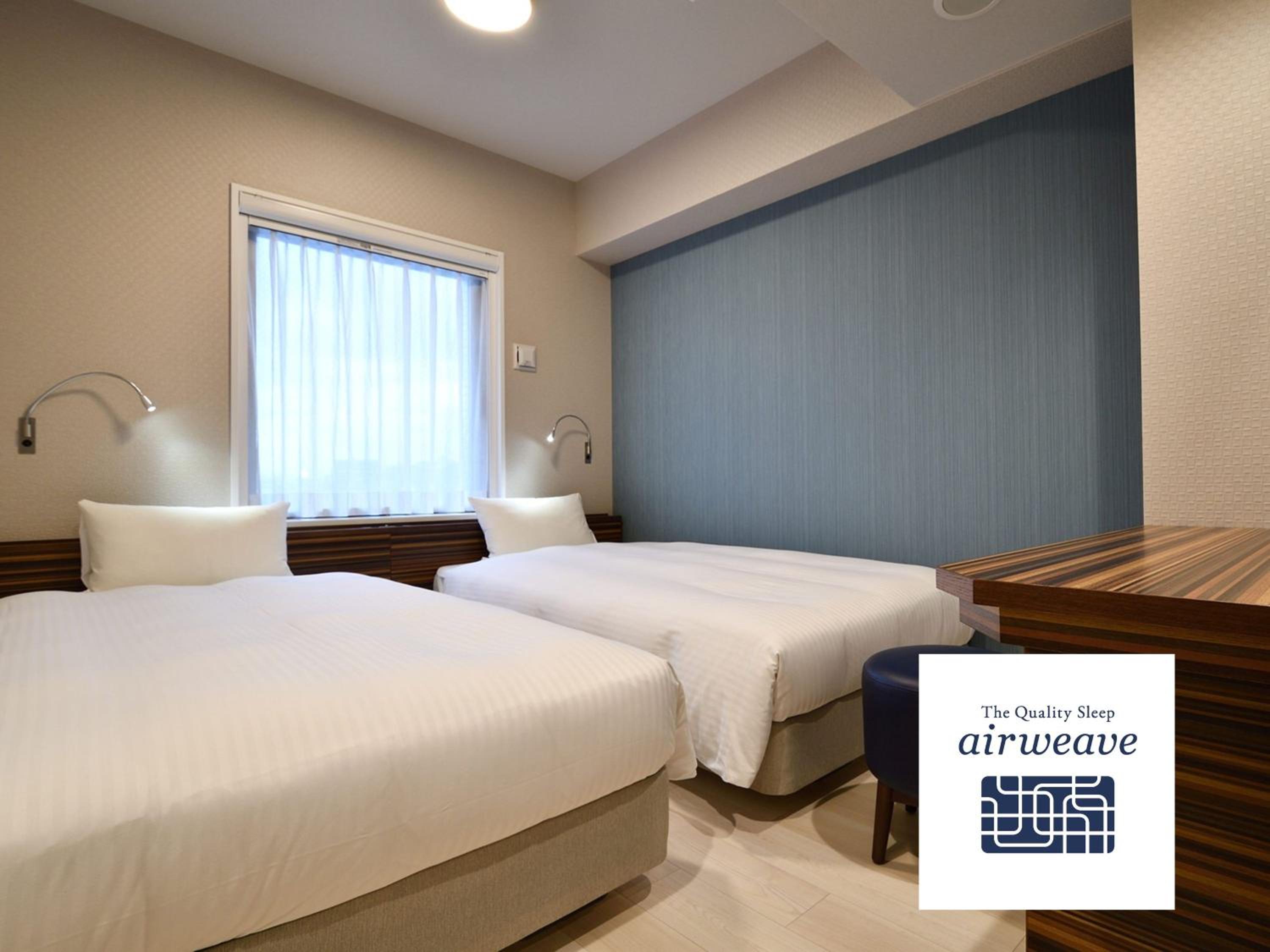 Standard Twin Room with Air Weave Mattress - Non-Smoking photo 2