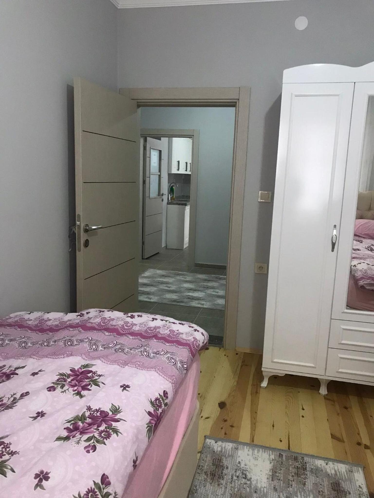 Three-Bedroom Apartment photo 1