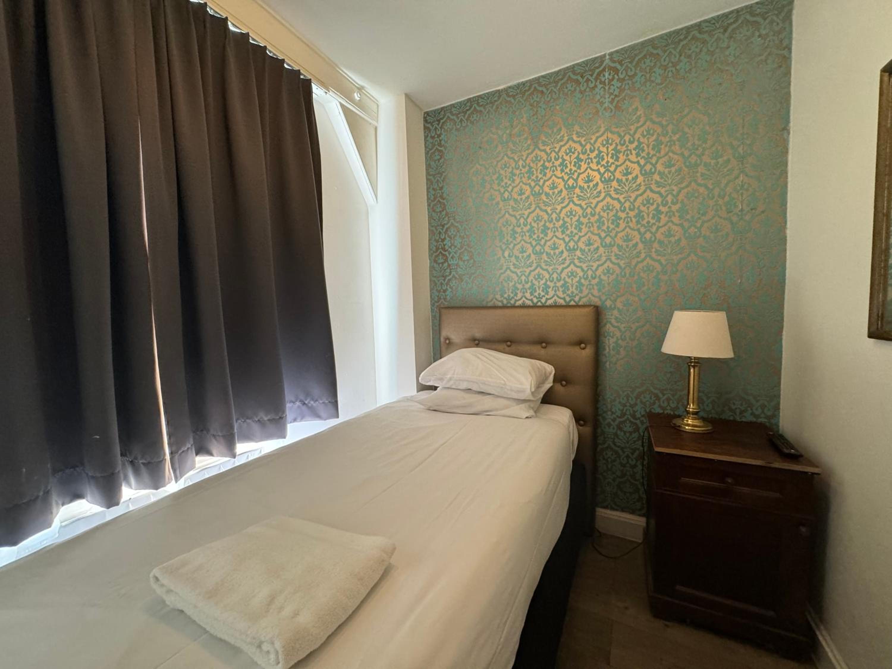 Standard Single Room with Shower photo 1