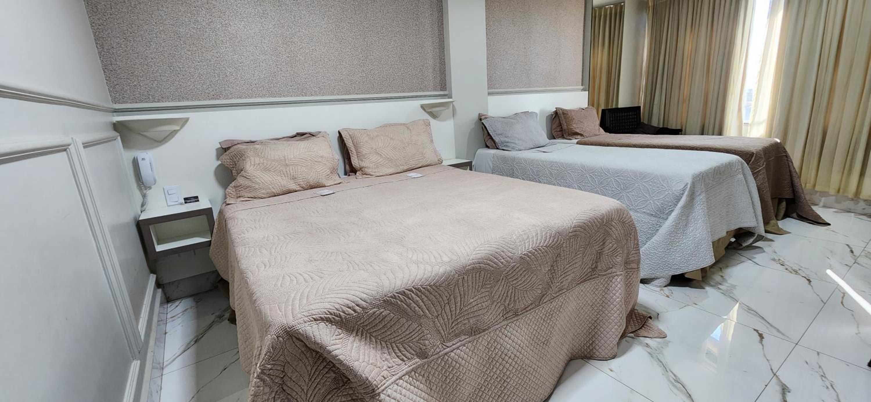 Quarto Quádruplo Luxo