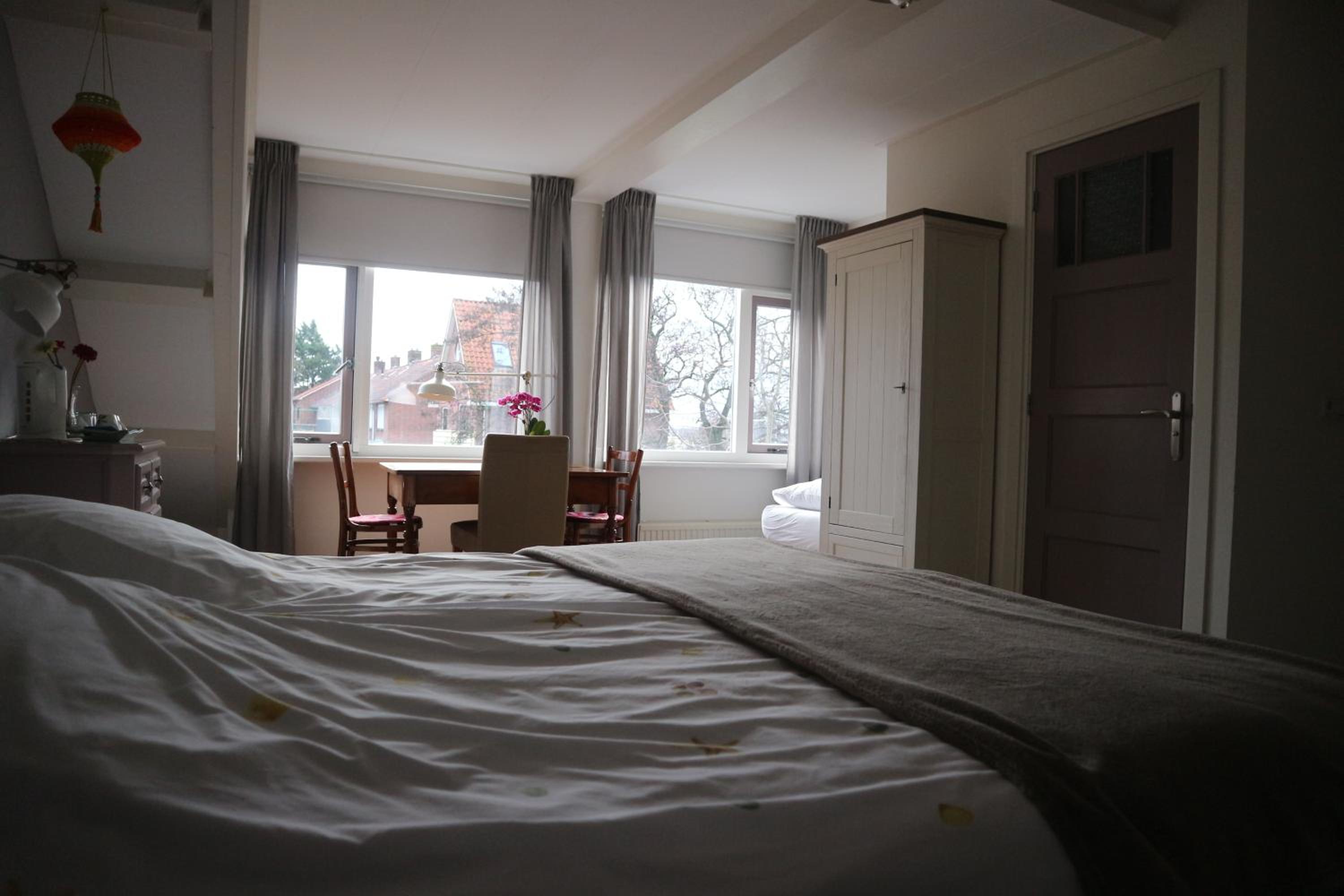 Triple Room with Private Bathroom photo 2