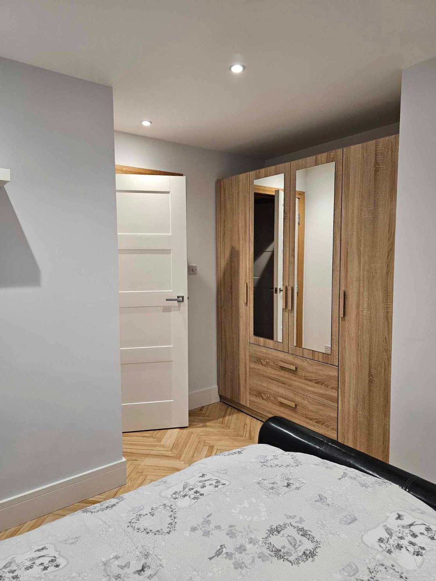 Three-Bedroom Apartment with Balcony photo 2