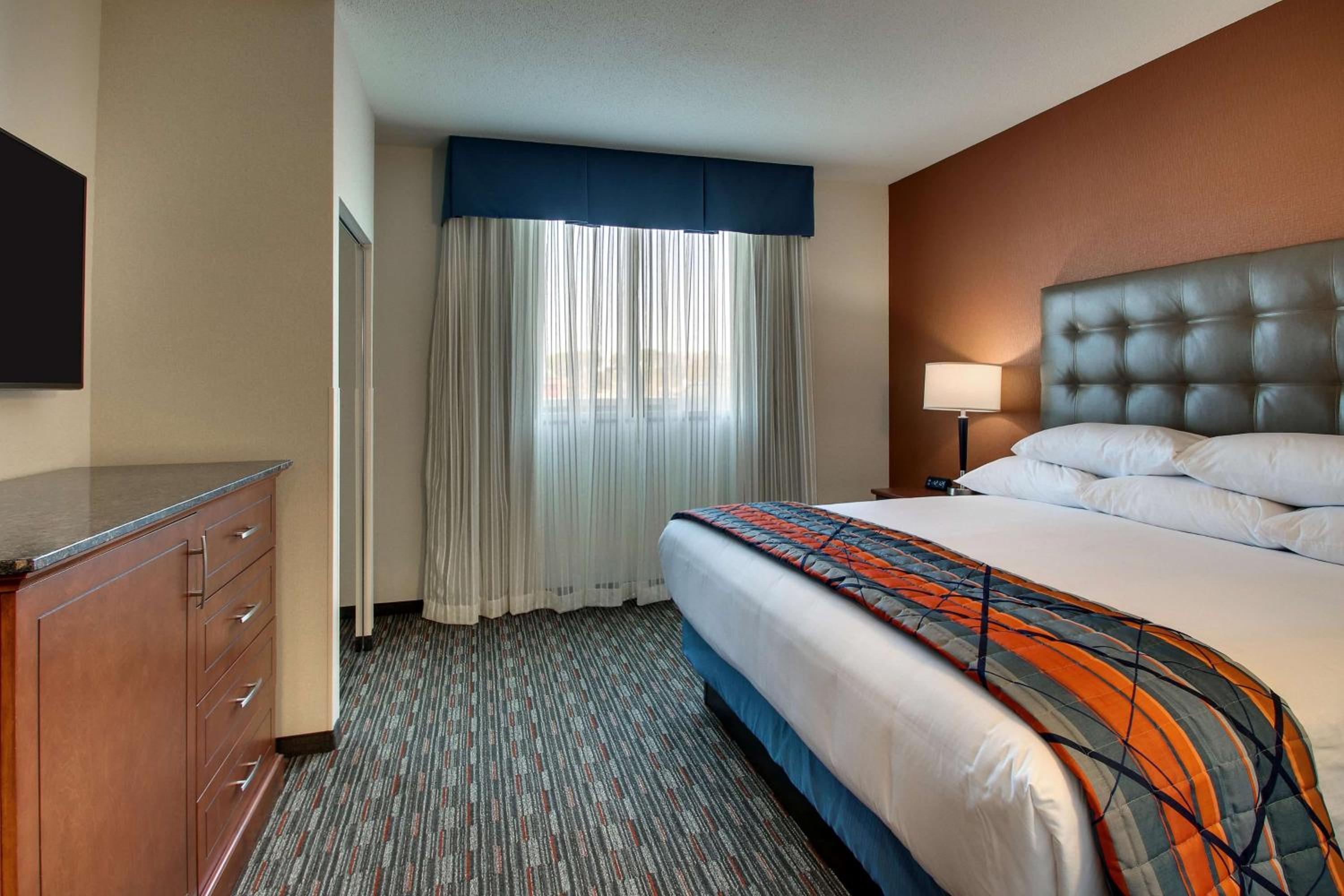 King Meeting Suite with Board Room Table, 2 Rooms - Hearing Accessible , Roll-in Shower