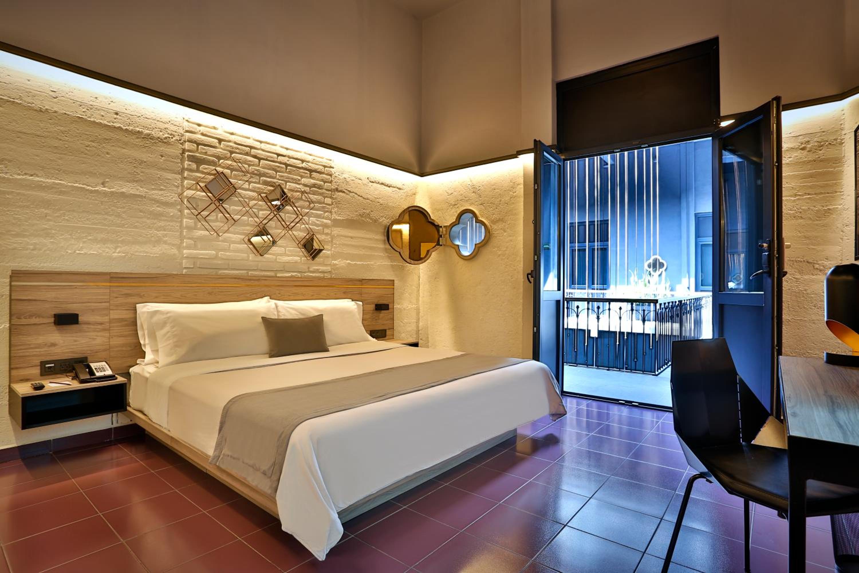 Queen Suite with Two Queen Beds and Sofa Bed