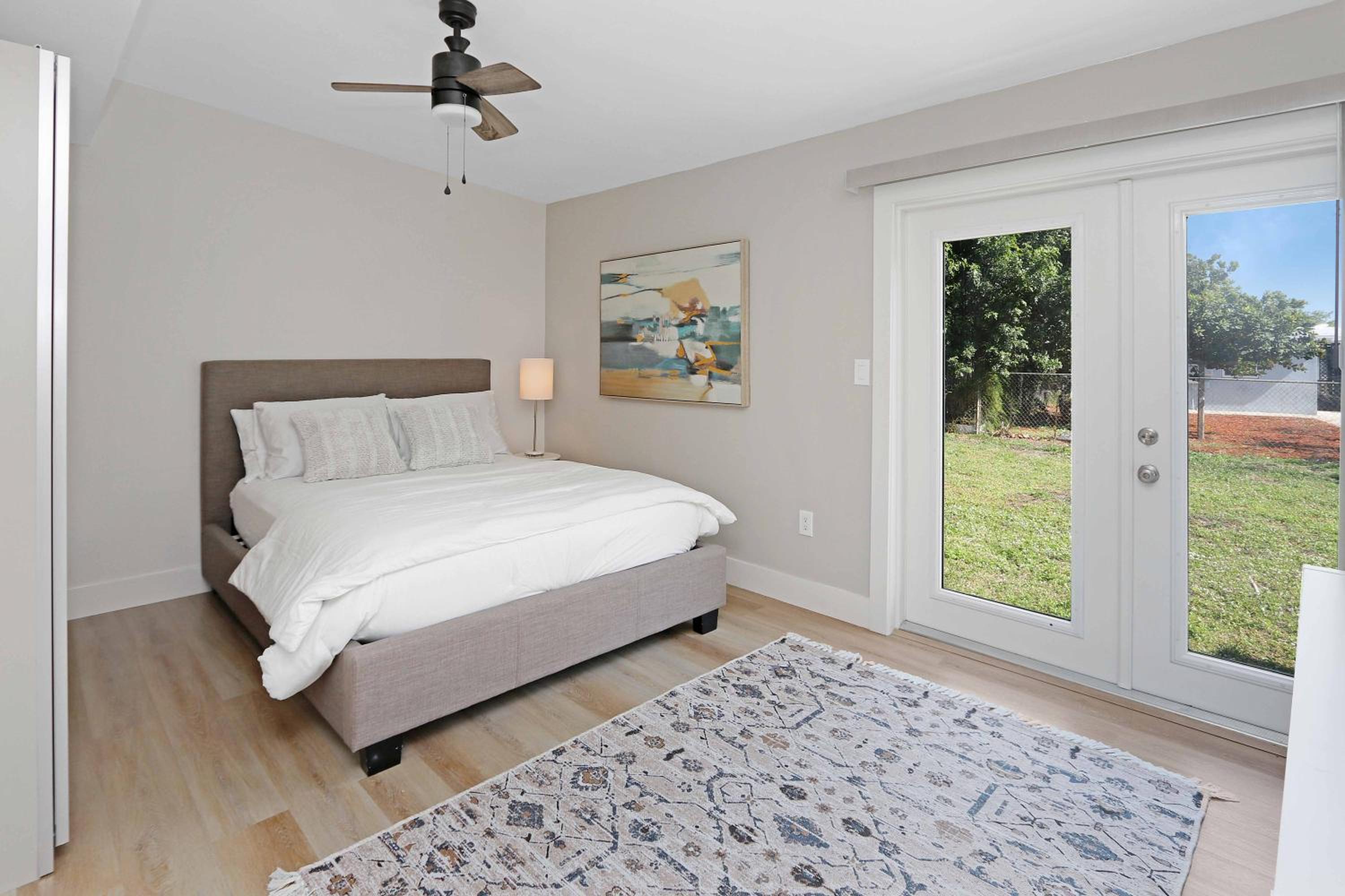 Three-Bedroom House - Photo 28