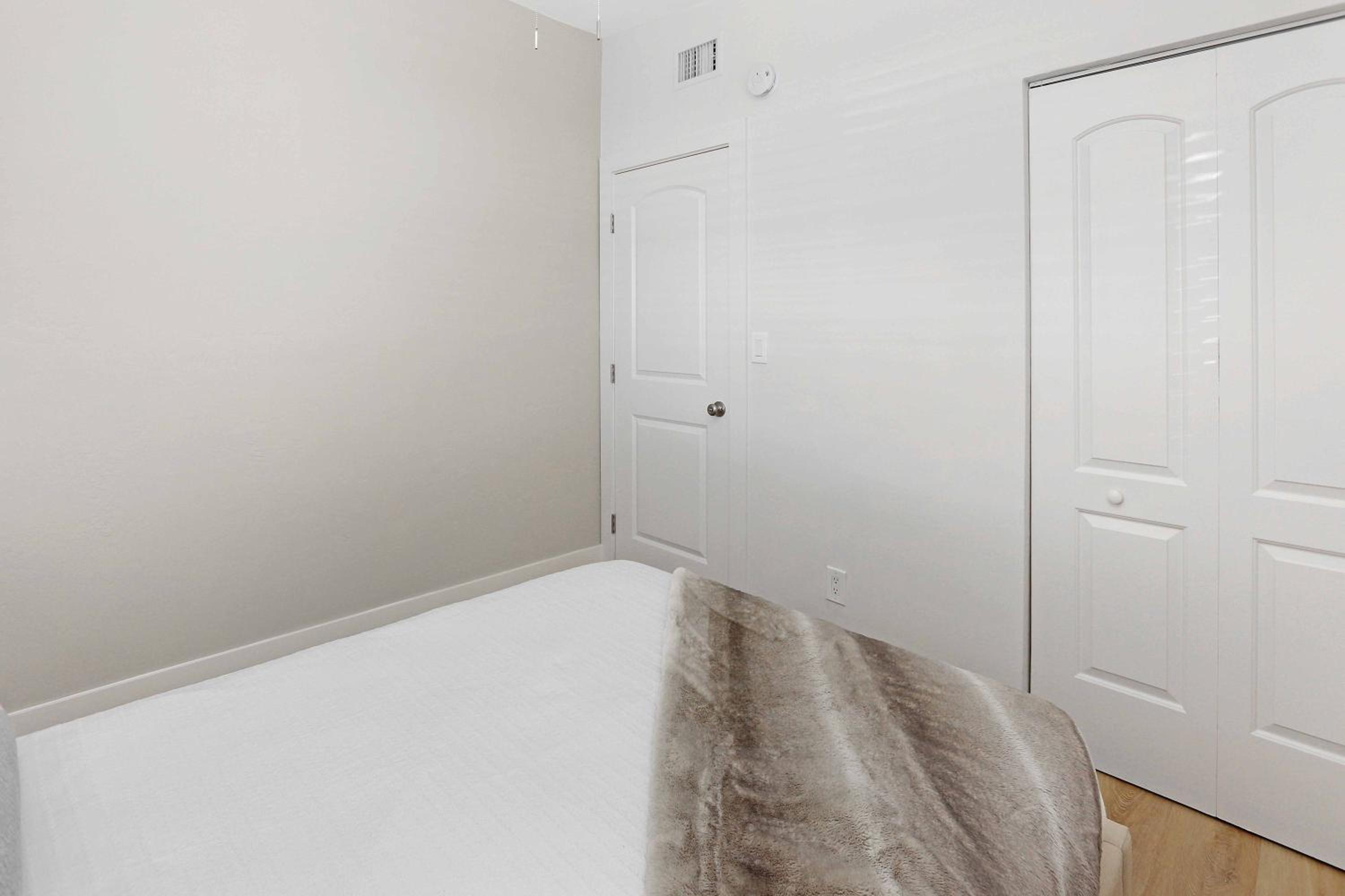Three-Bedroom House - Photo 24