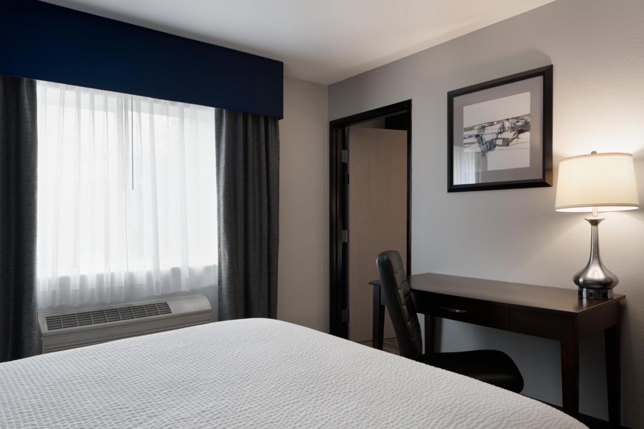 One-Bedroom Suite with Three Queen Beds - Photo 1