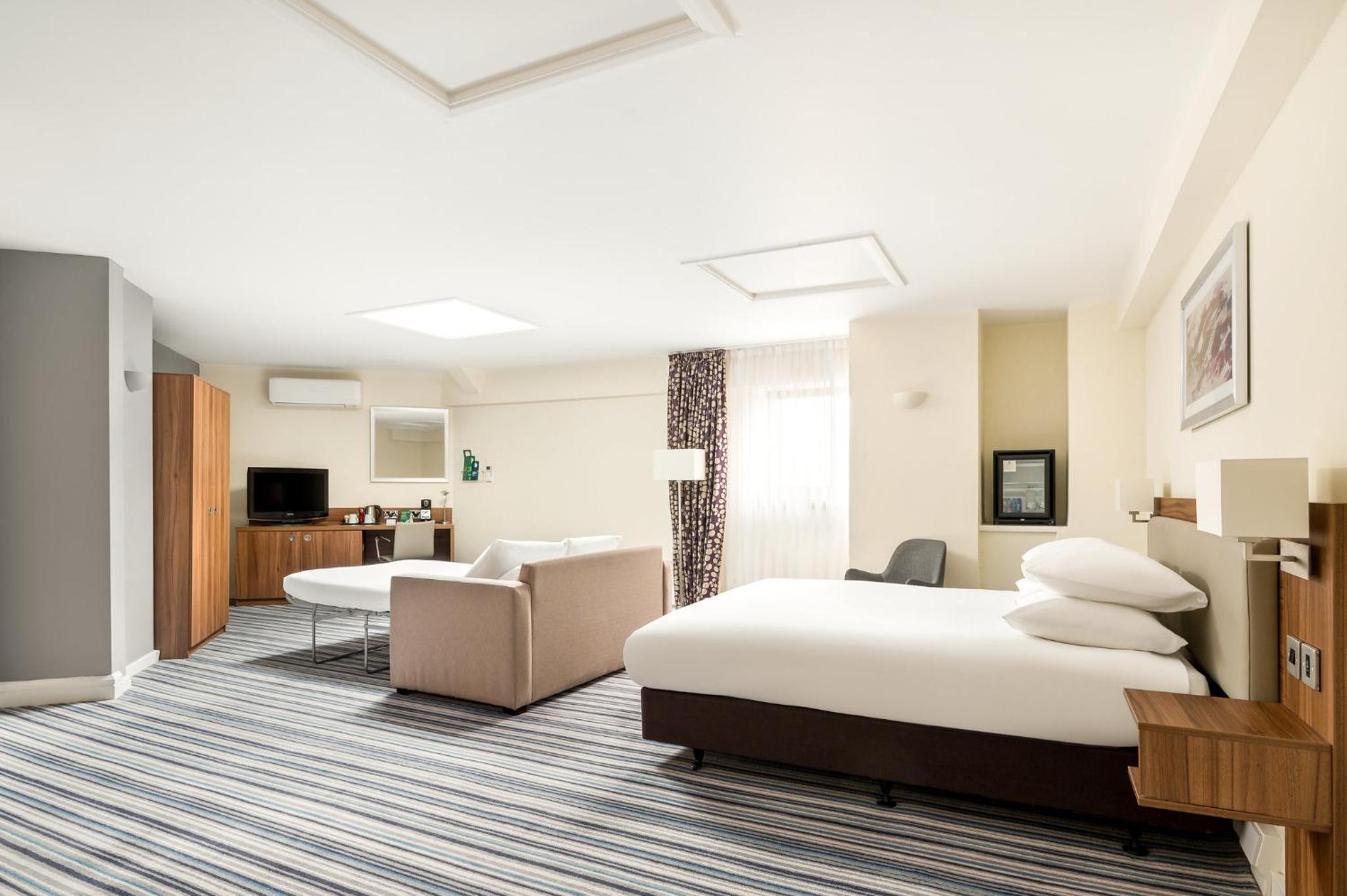 King Suite with Sofa Bed - Photo 9