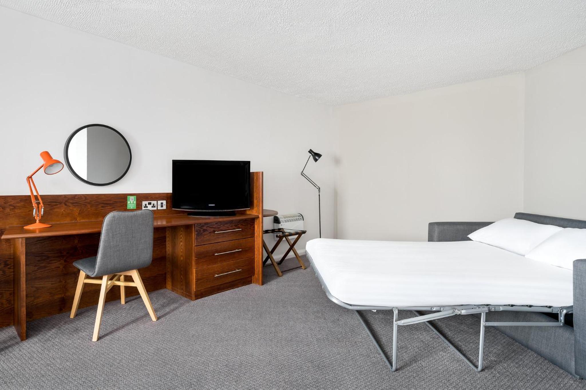 King Suite with Sofa Bed - Photo 7