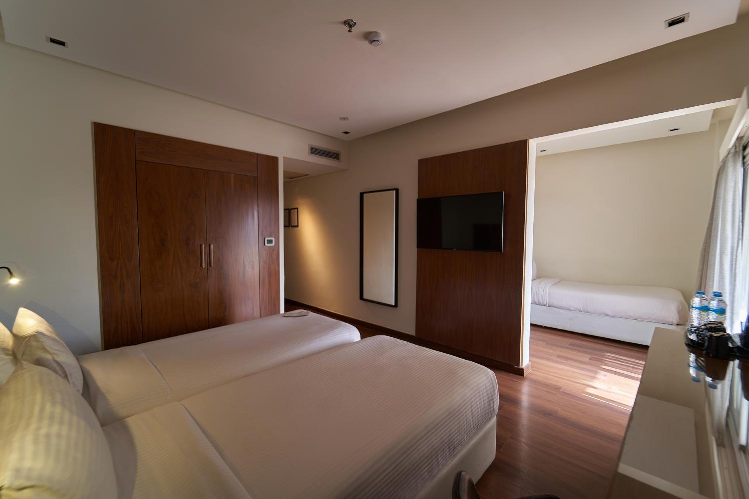 Deluxe Triple Room with Balcony