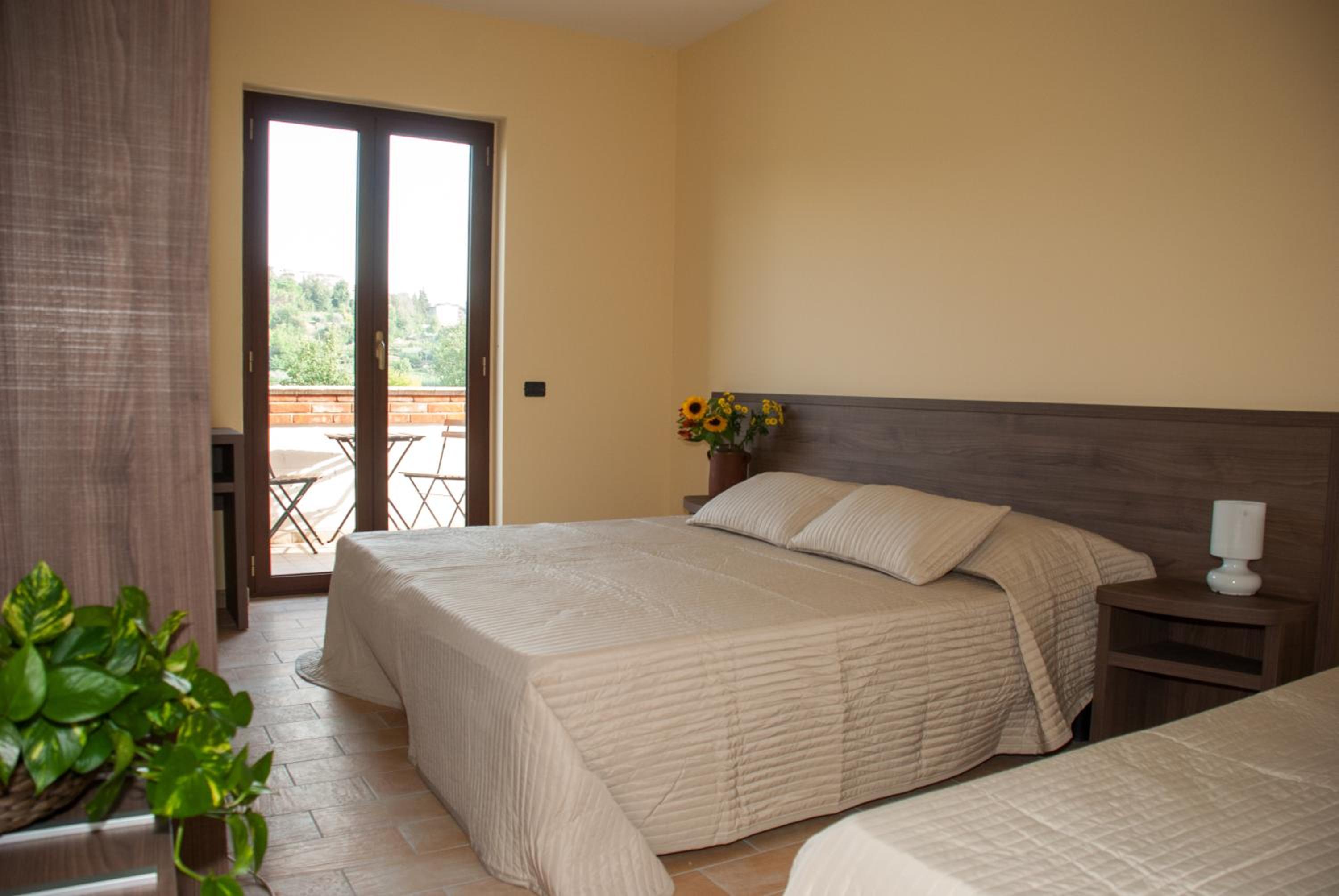 Quadruple Room with Balcony - Photo 1