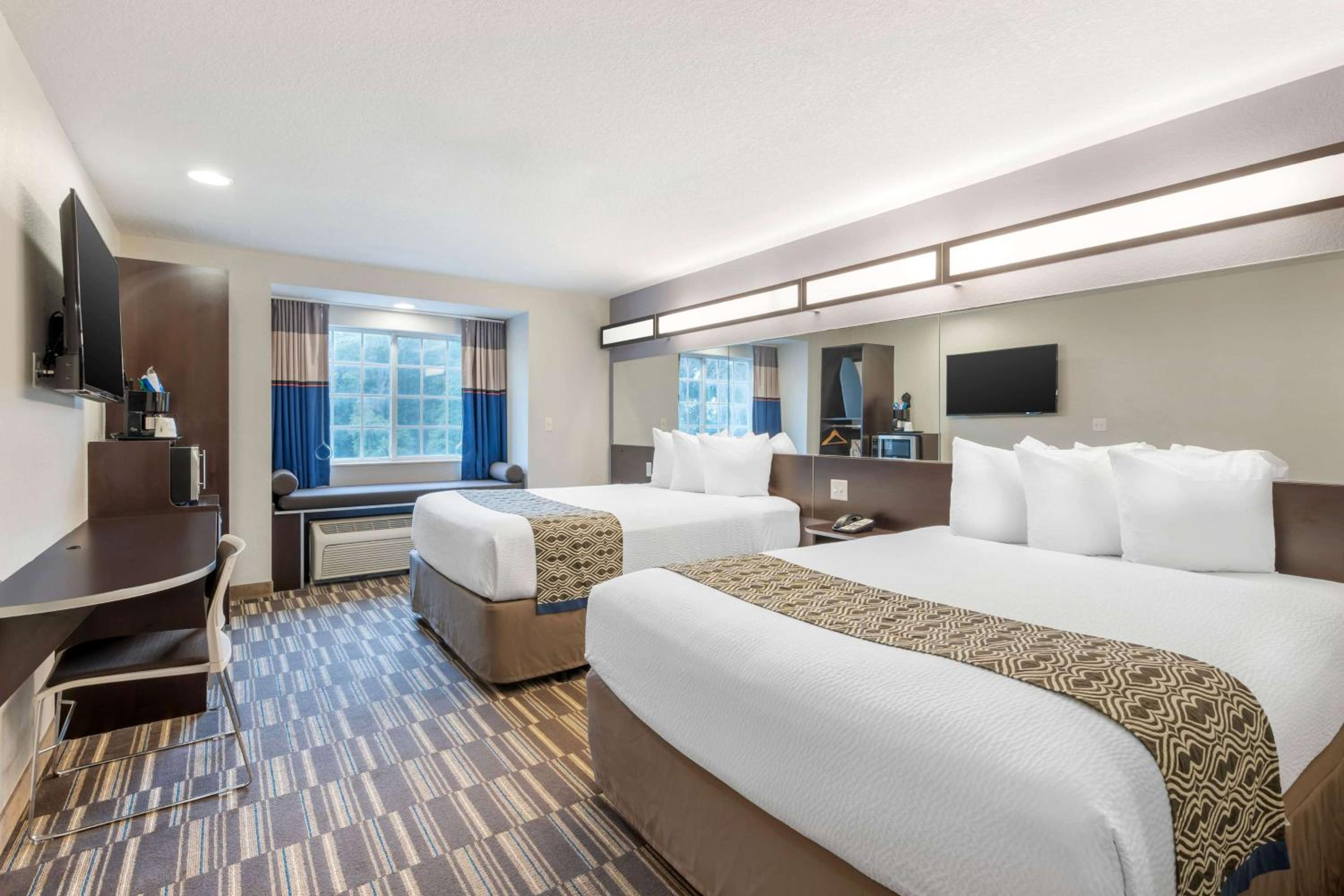 Queen Room with Two Queen Beds and Bath Tub - Mobility/Hearing Accessible - Non-Smoking - Photo 1
