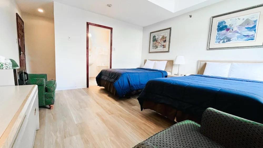 Deluxe Two Double Bed Room - Photo 2