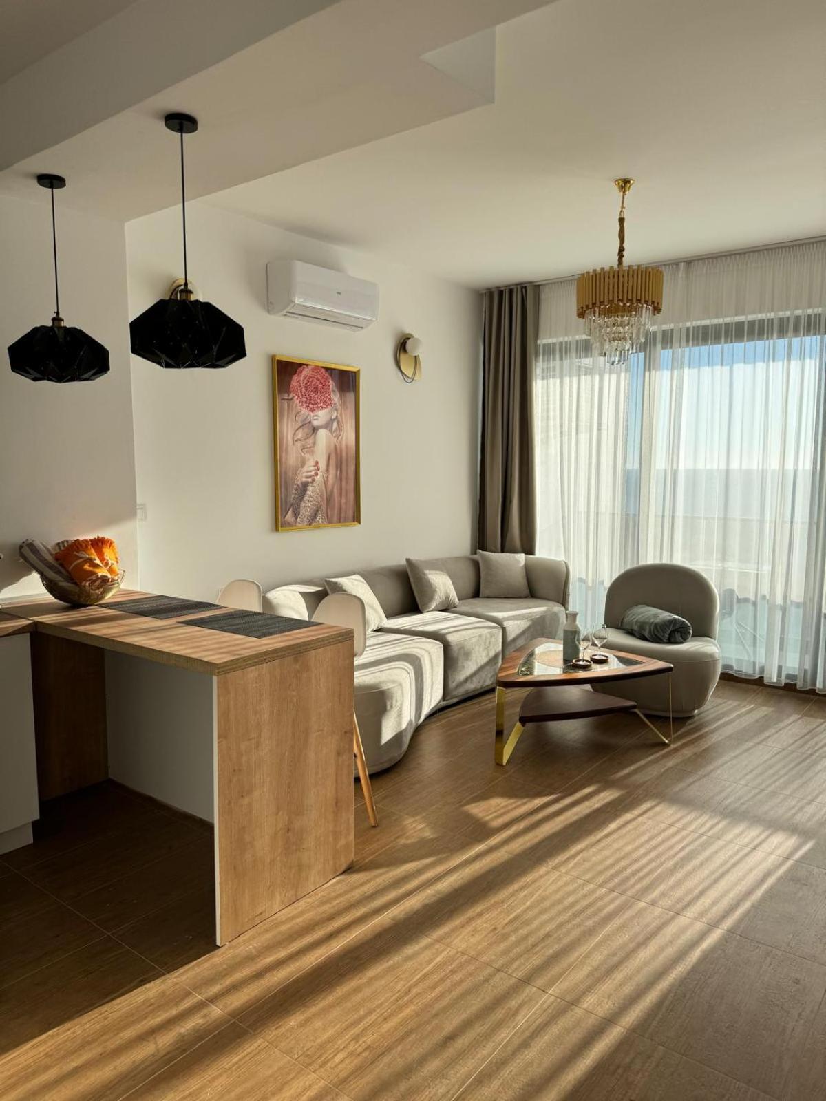 One-Bedroom Apartment with Balcony and Sea View