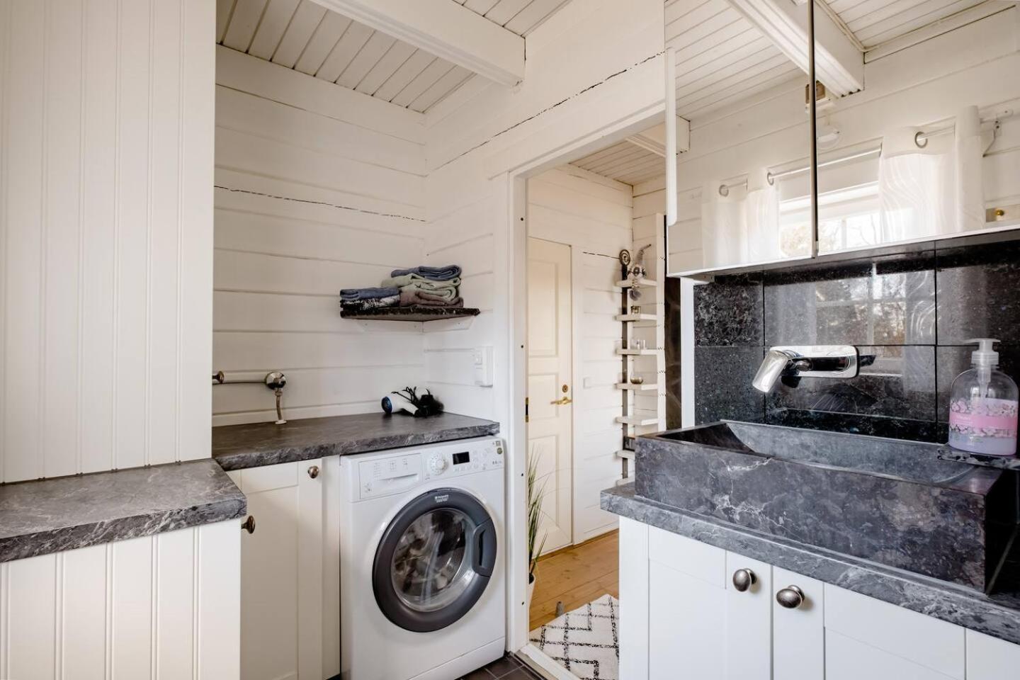 Three-Bedroom House - Photo 32