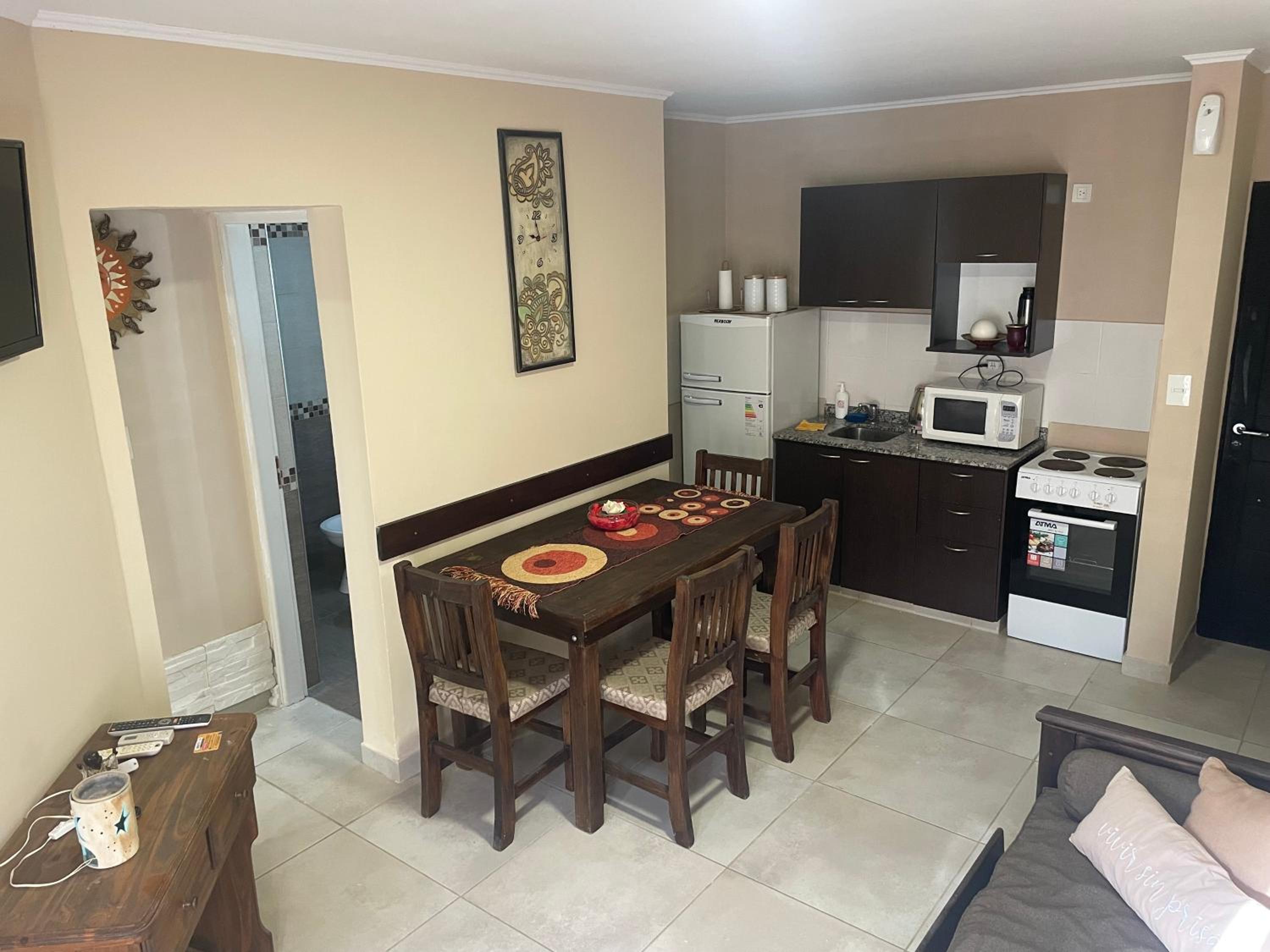 One-Bedroom Apartment with Balcony and City View photo 2
