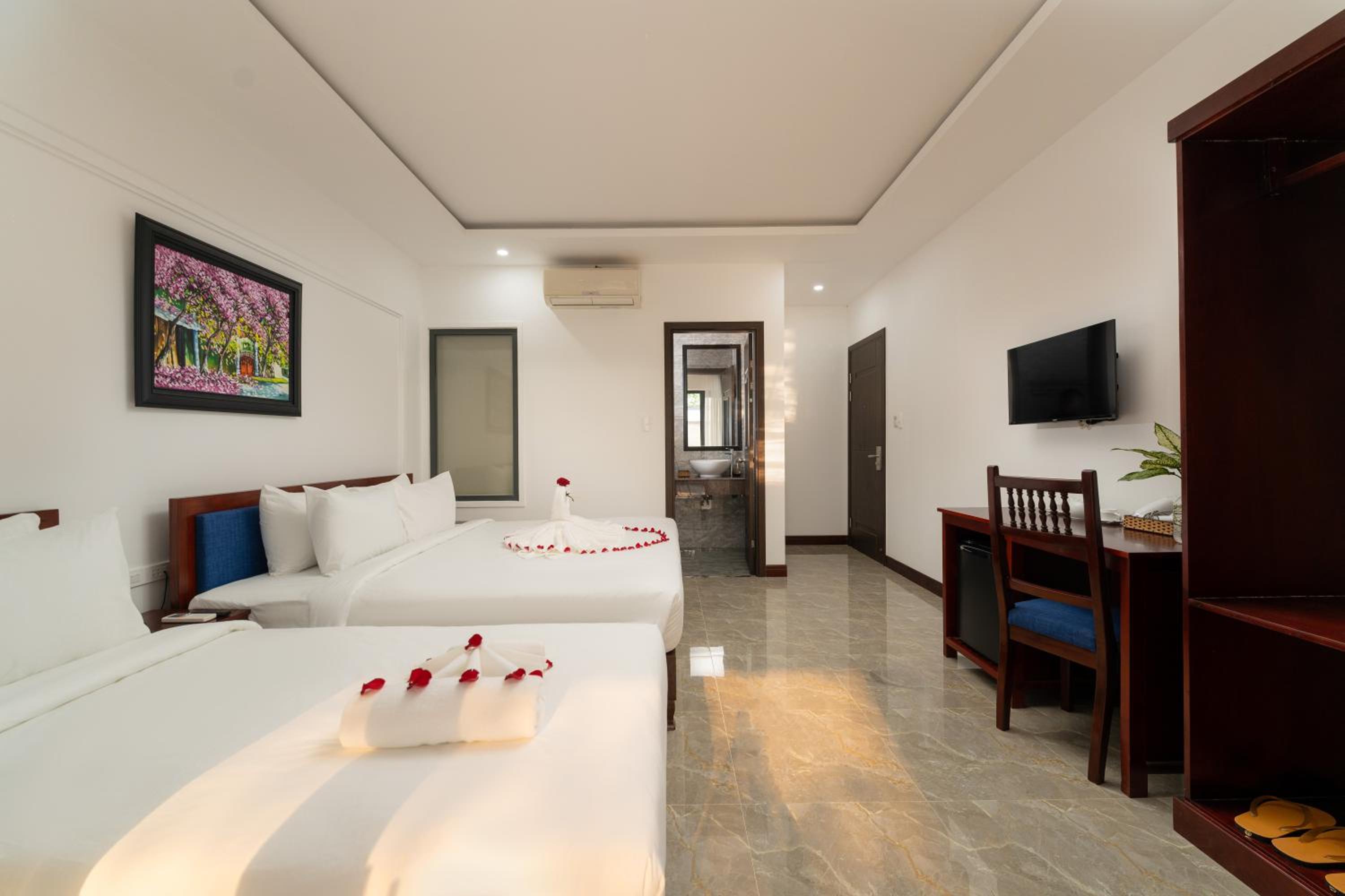 Deluxe Triple Room - Photo 6