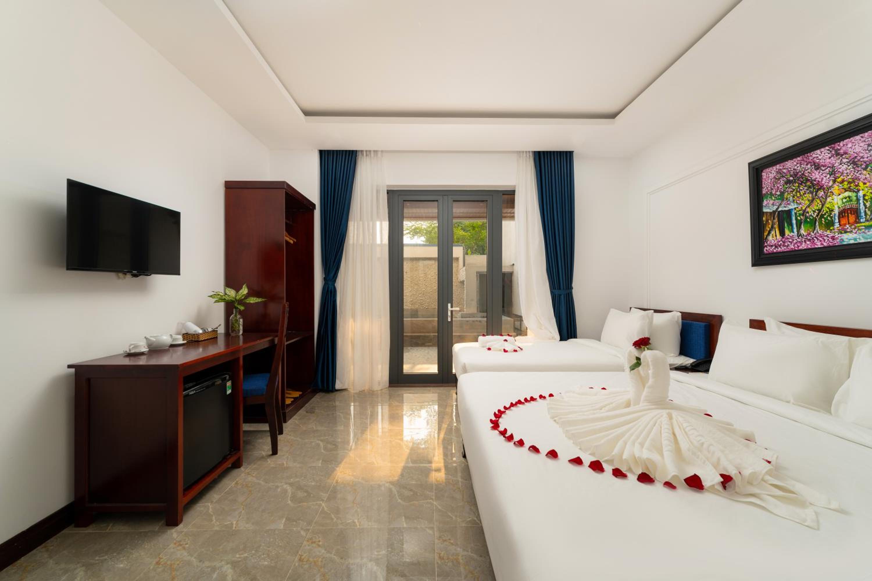 Deluxe Triple Room - Photo 5