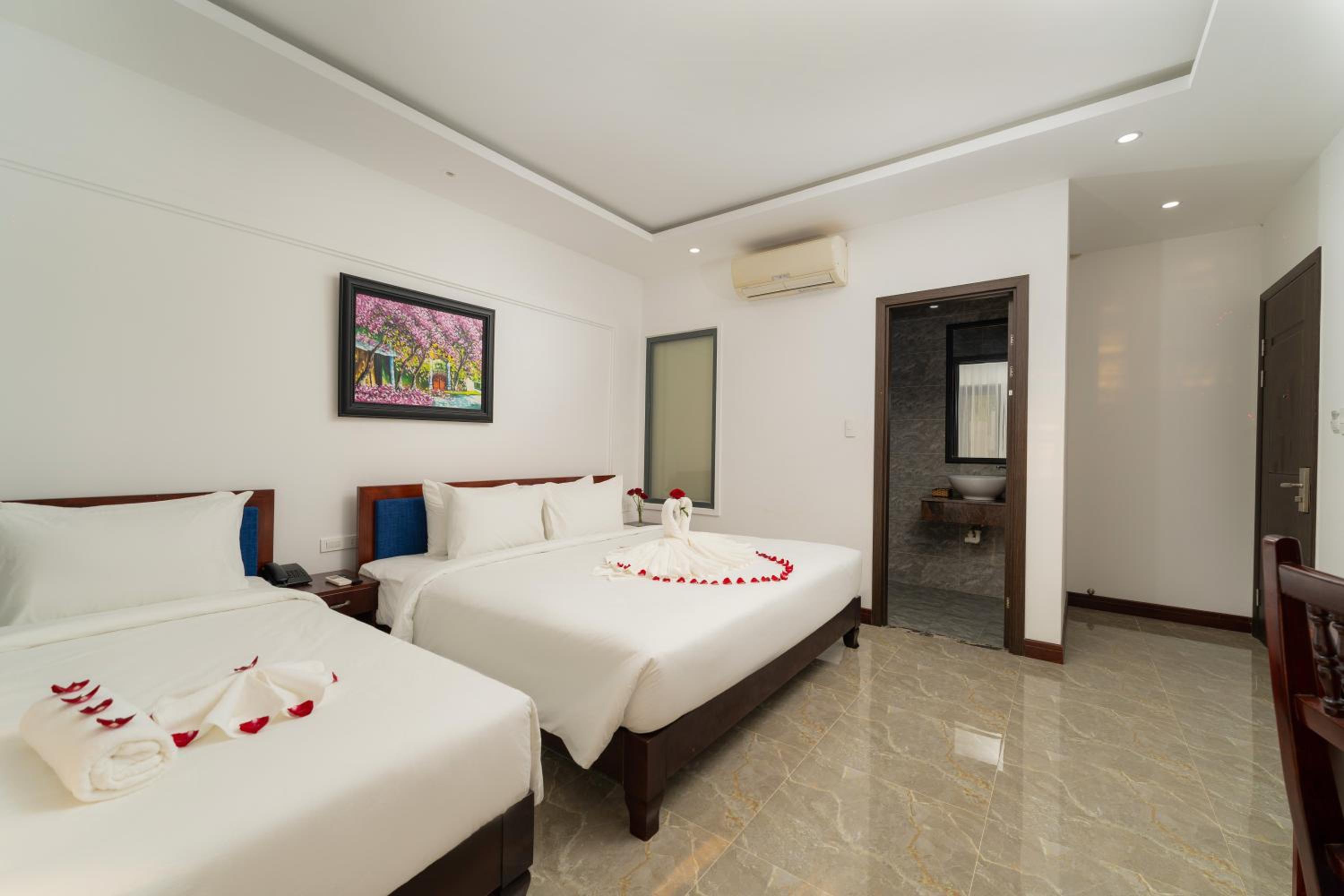 Deluxe Triple Room - Photo 1