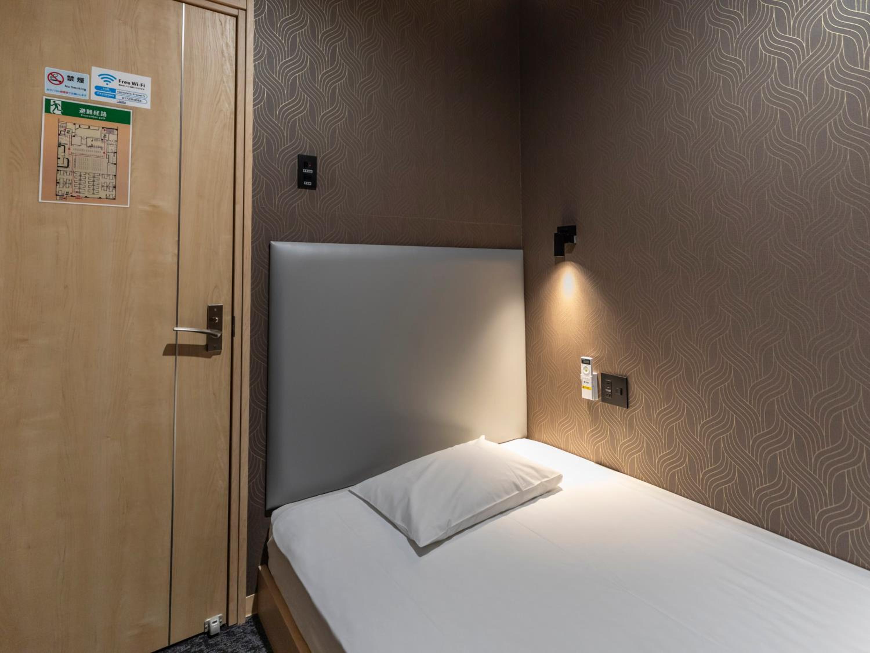 Bed in Male Dormitory Room photo 3