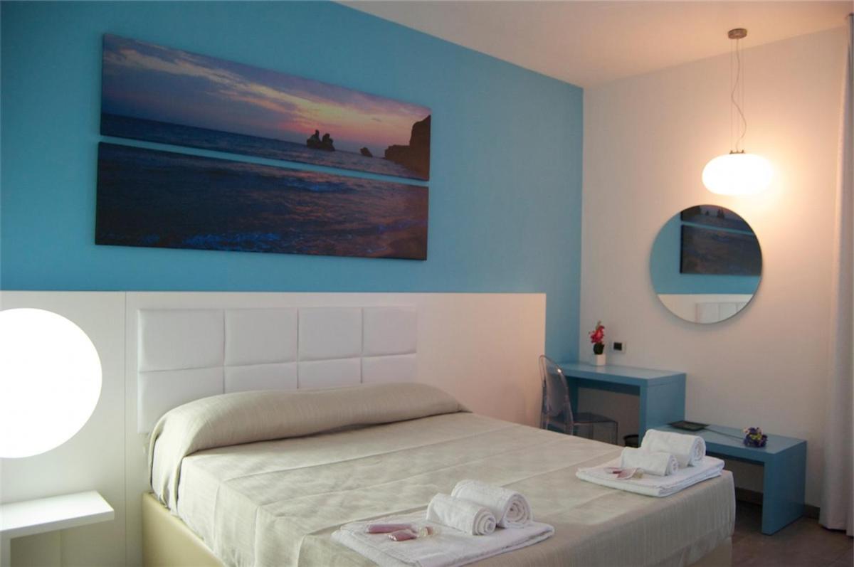 Quadruple Room - Photo 11