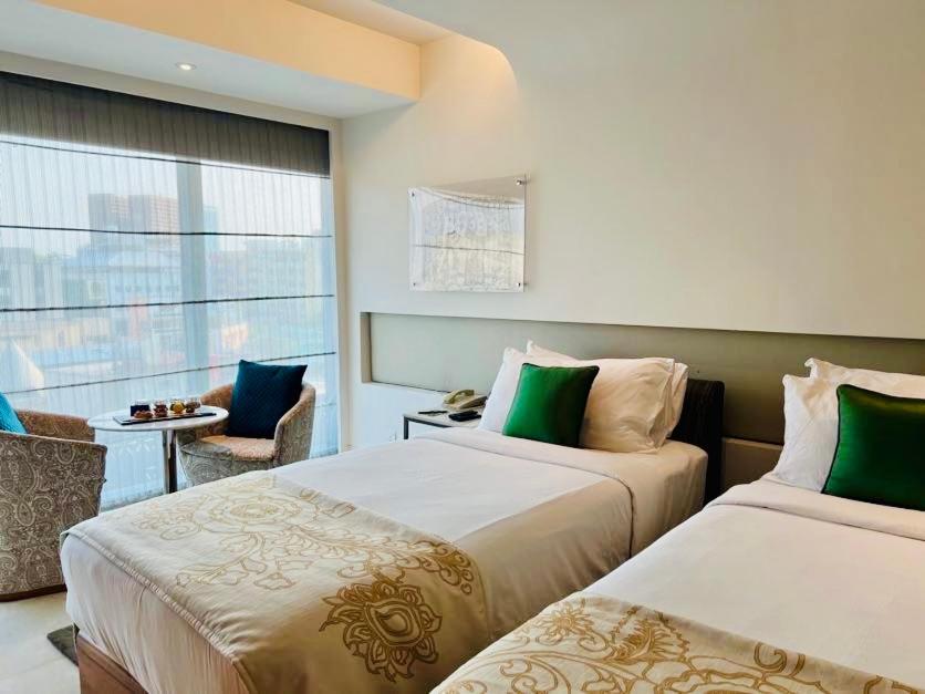 Luxury Double or Twin Room (20% off on session of Spa ,15% Off on Laundry service ,Complimentary Welcome Drink on arrival) Luxury Double or Twin Room (20% off on session of Spa ,15% Off on Laundry service ,Complimentary Welcome Drink on arrival)