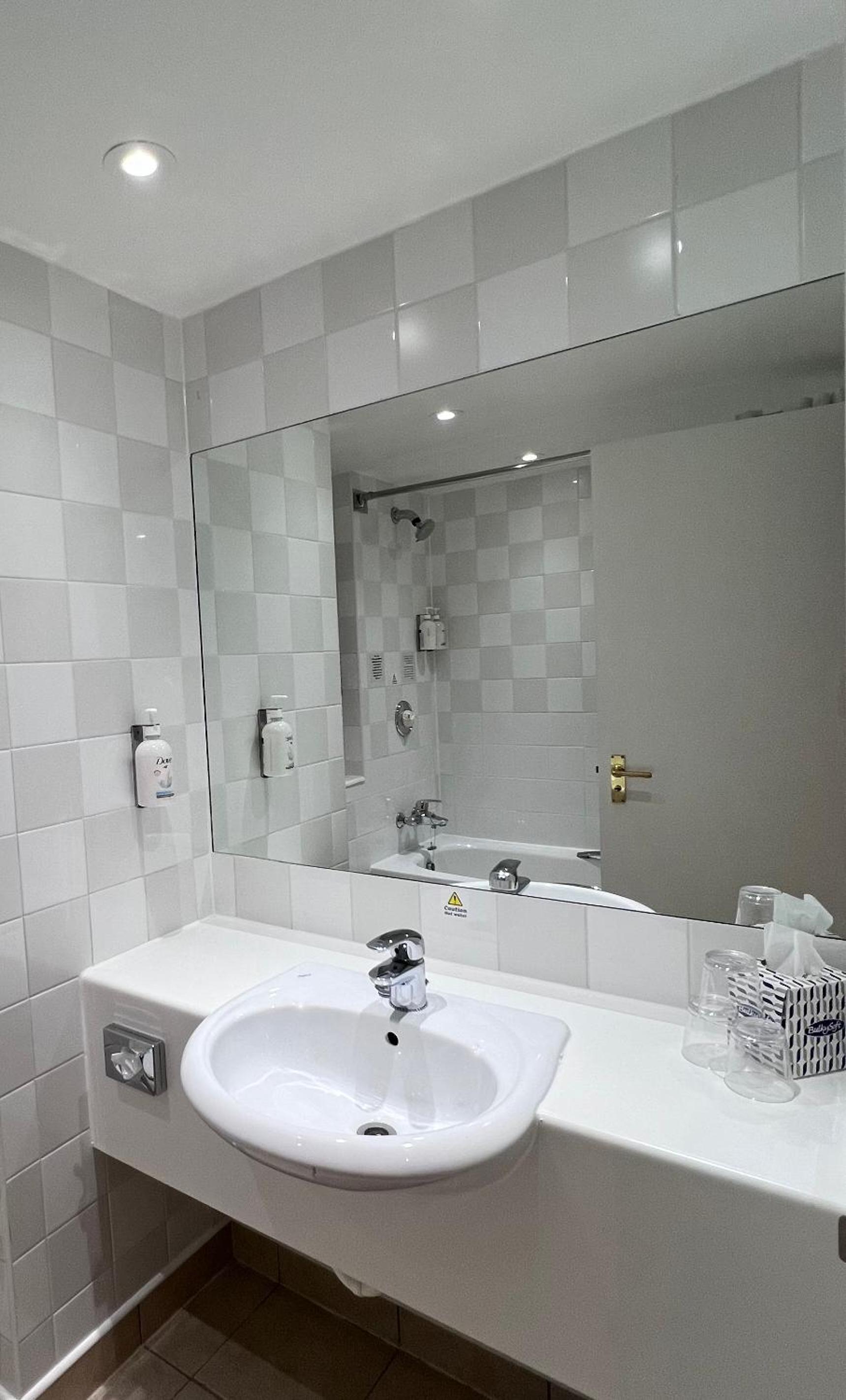 Experience luxury and comfort in our stylish bathroom space.