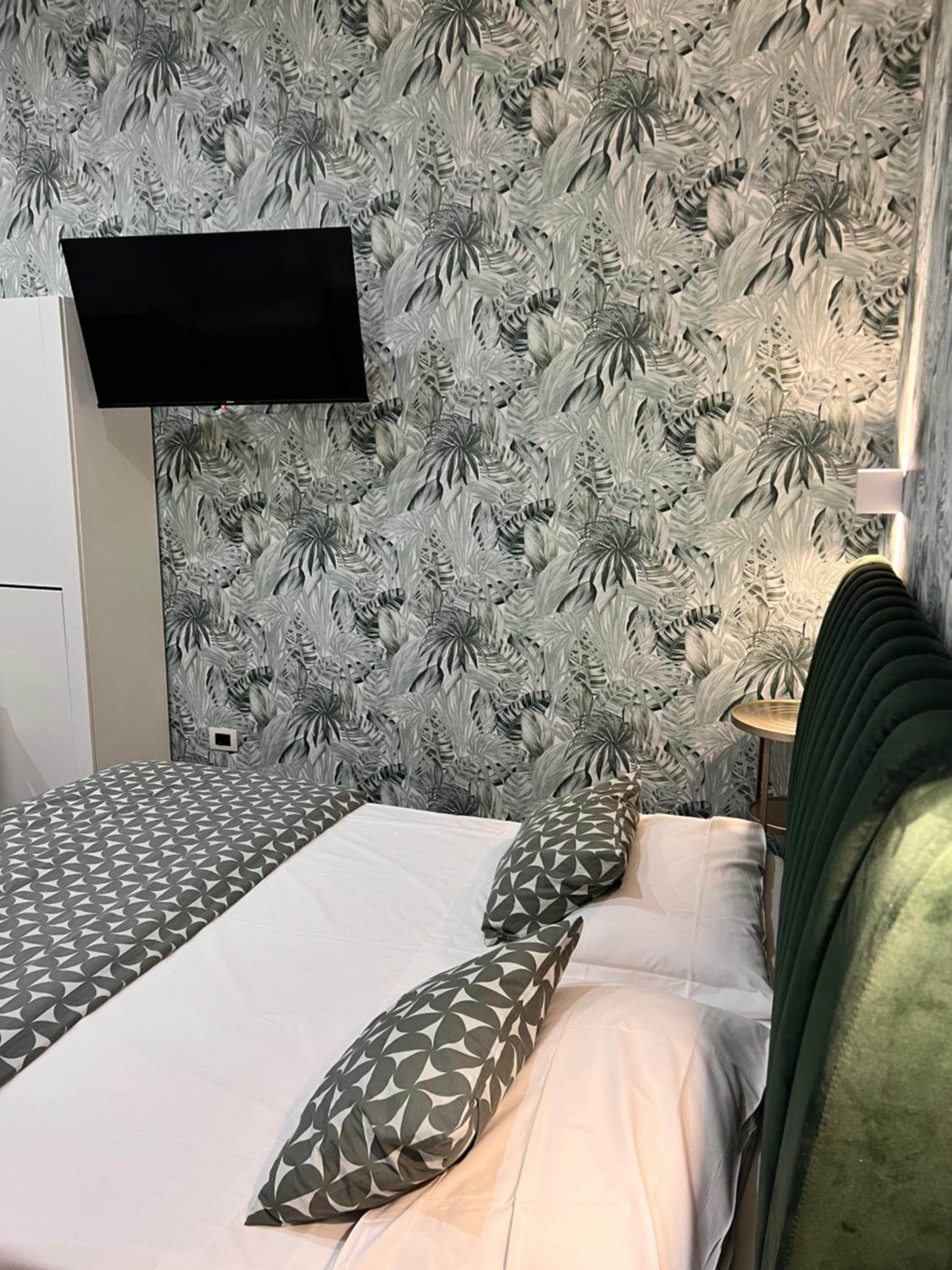 Quadruple Room with Balcony - Photo 1