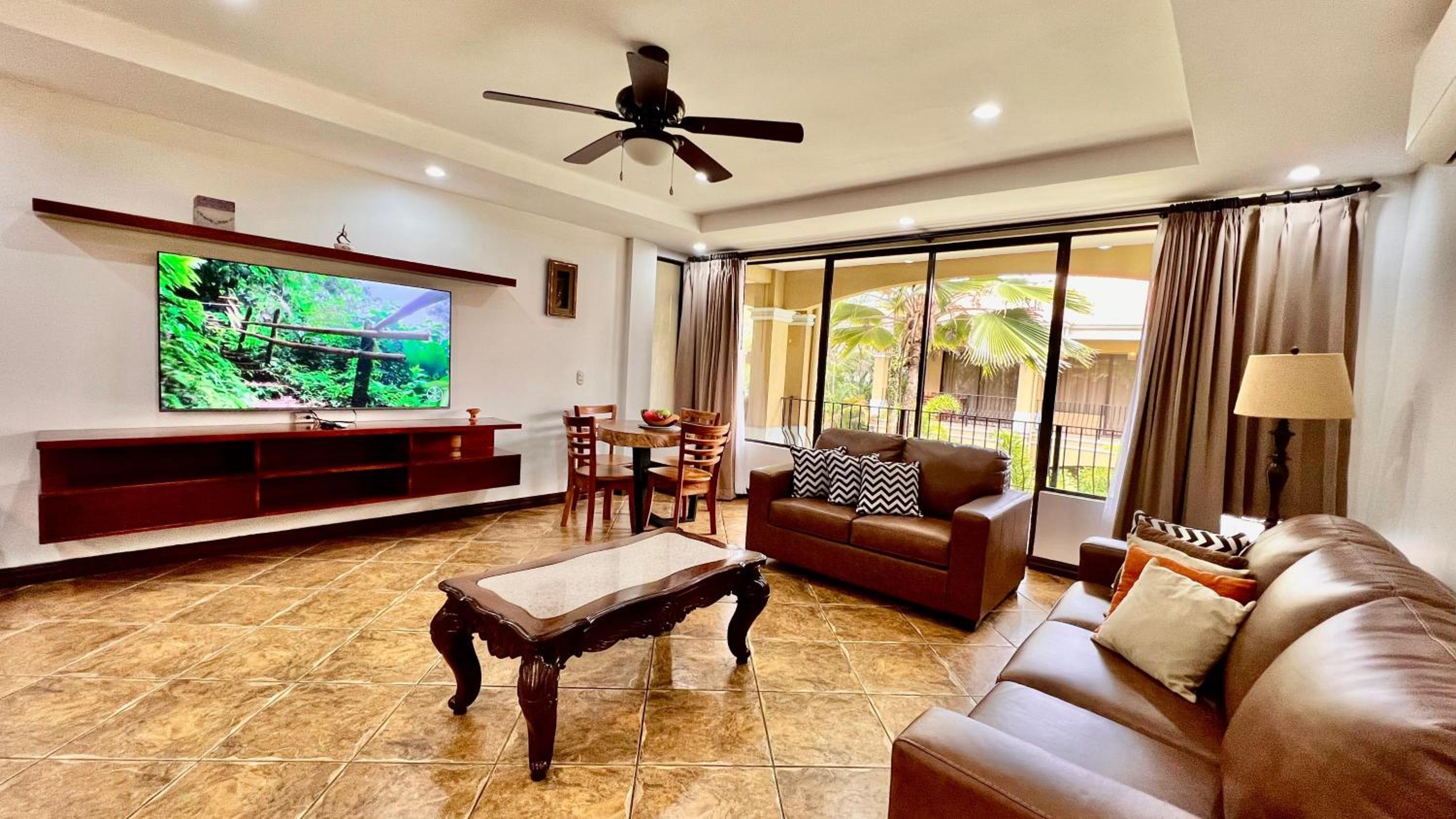 Family Room with Balcony - Photo 10