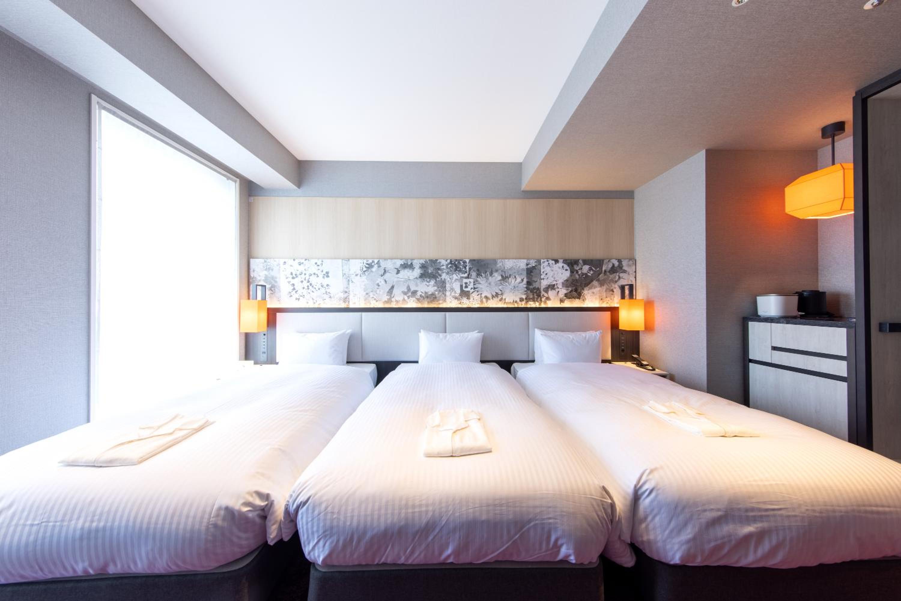Casual Triple Room with Shower Booth (1 Adult) photo 2