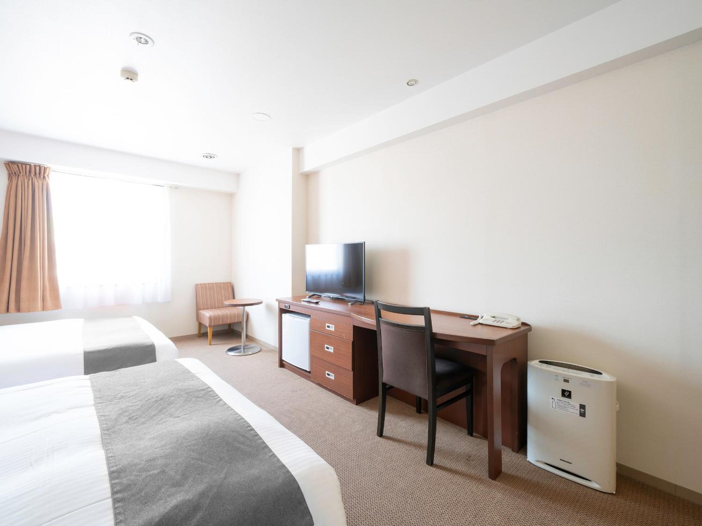 Twin Room - Non-Smoking - Photo 6