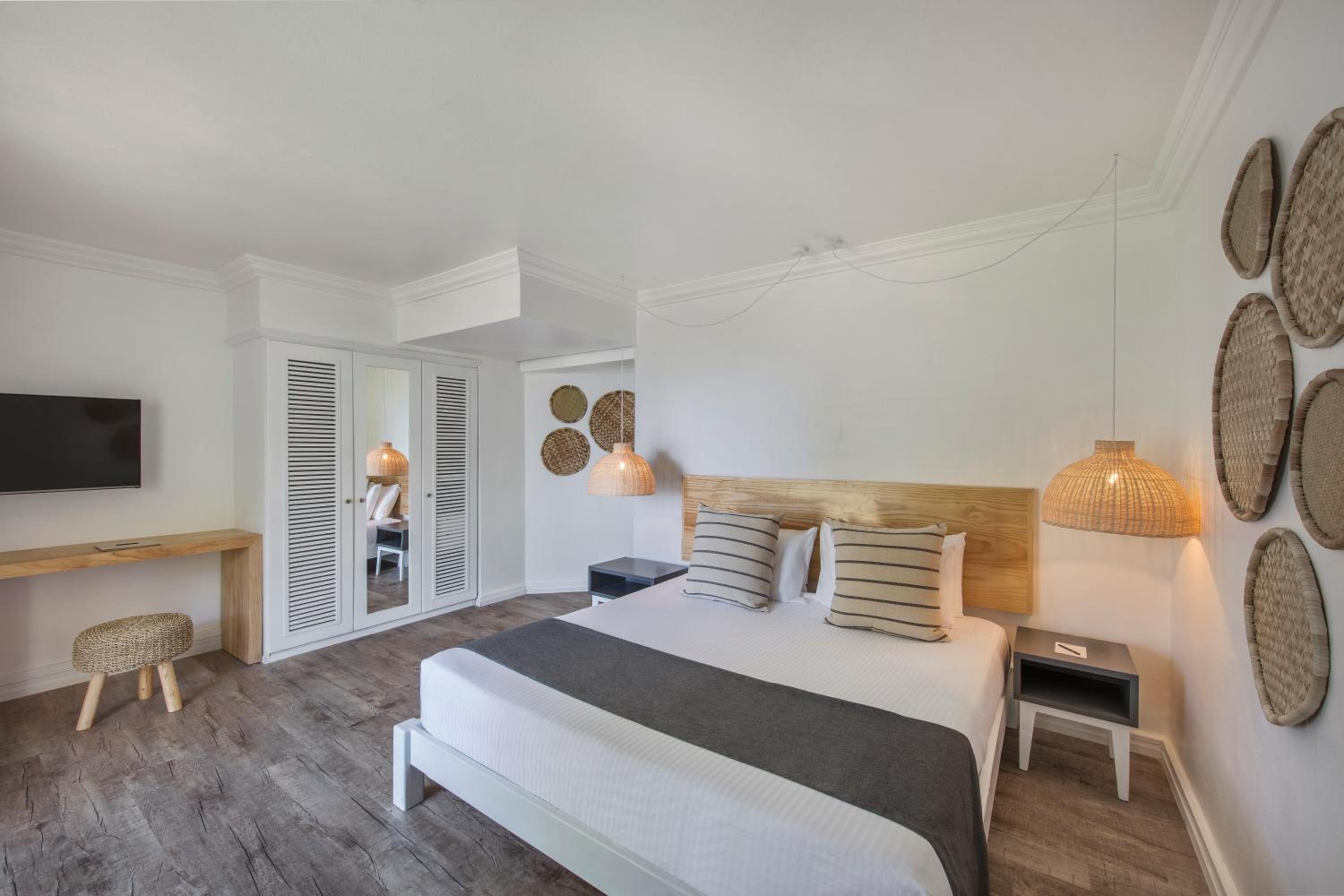 Relax in this beautifully designed, cozy hotel room.