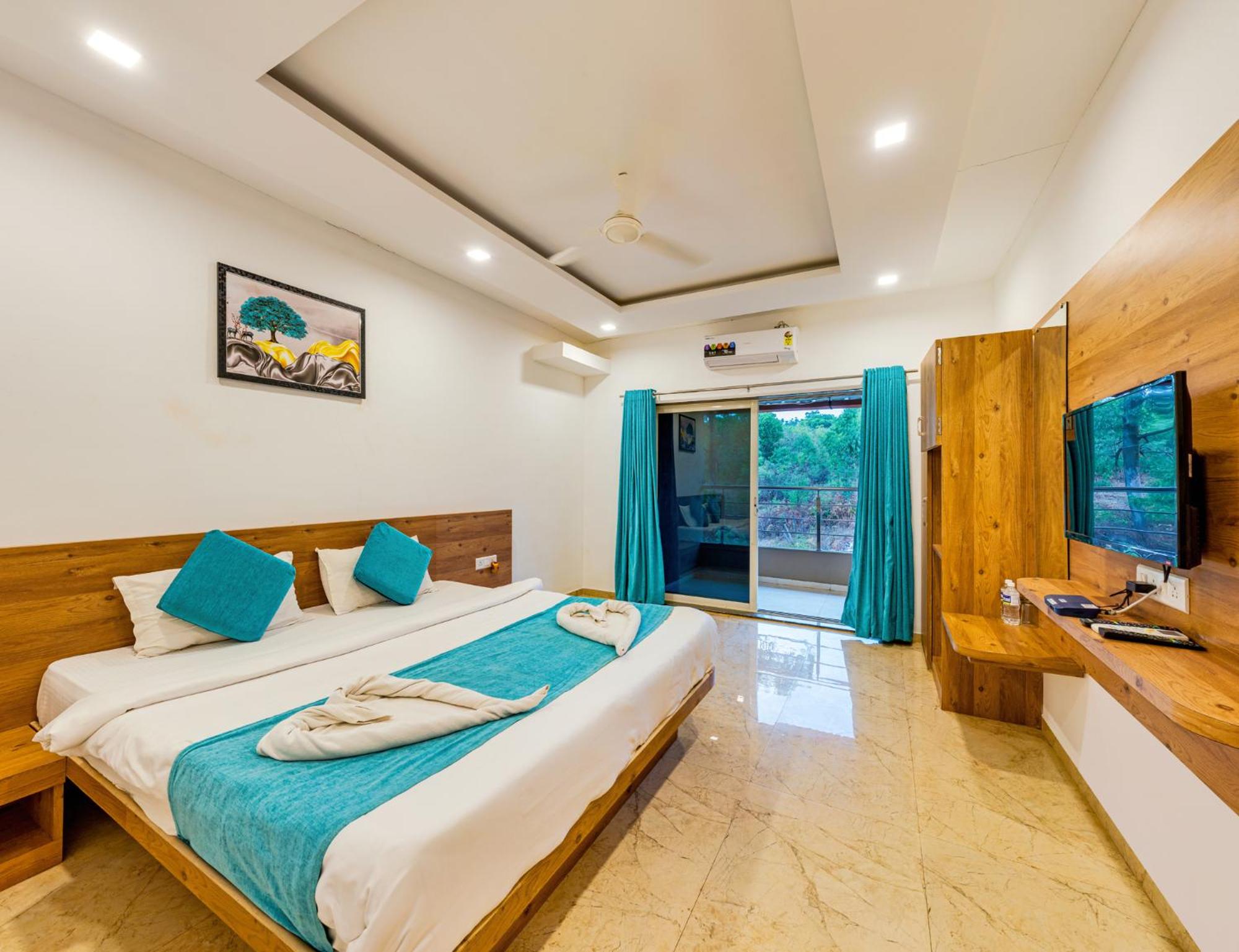 Super Deluxe Room With Balcony - Photo 8