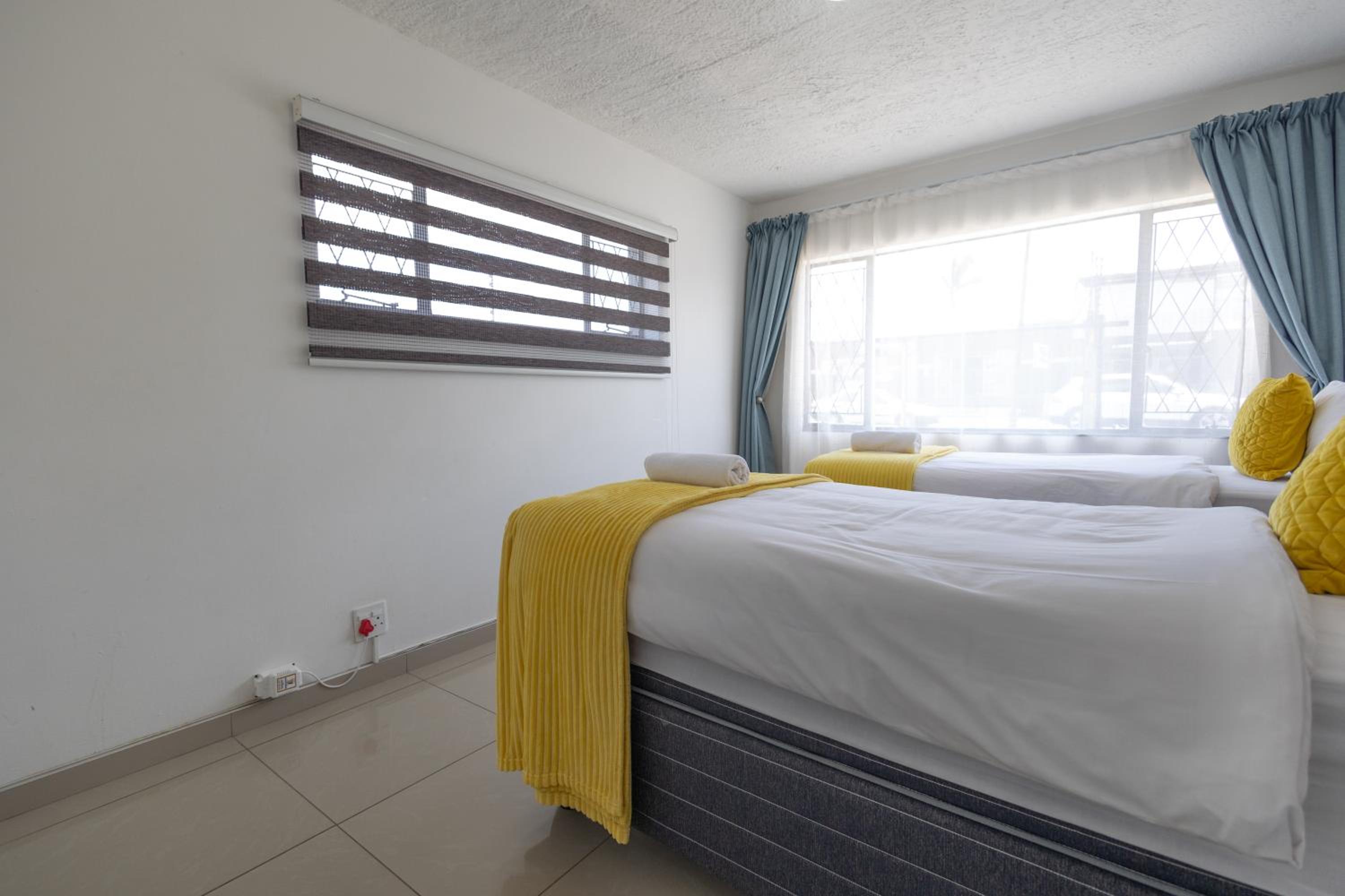 Three-Bedroom Apartment - Photo 2