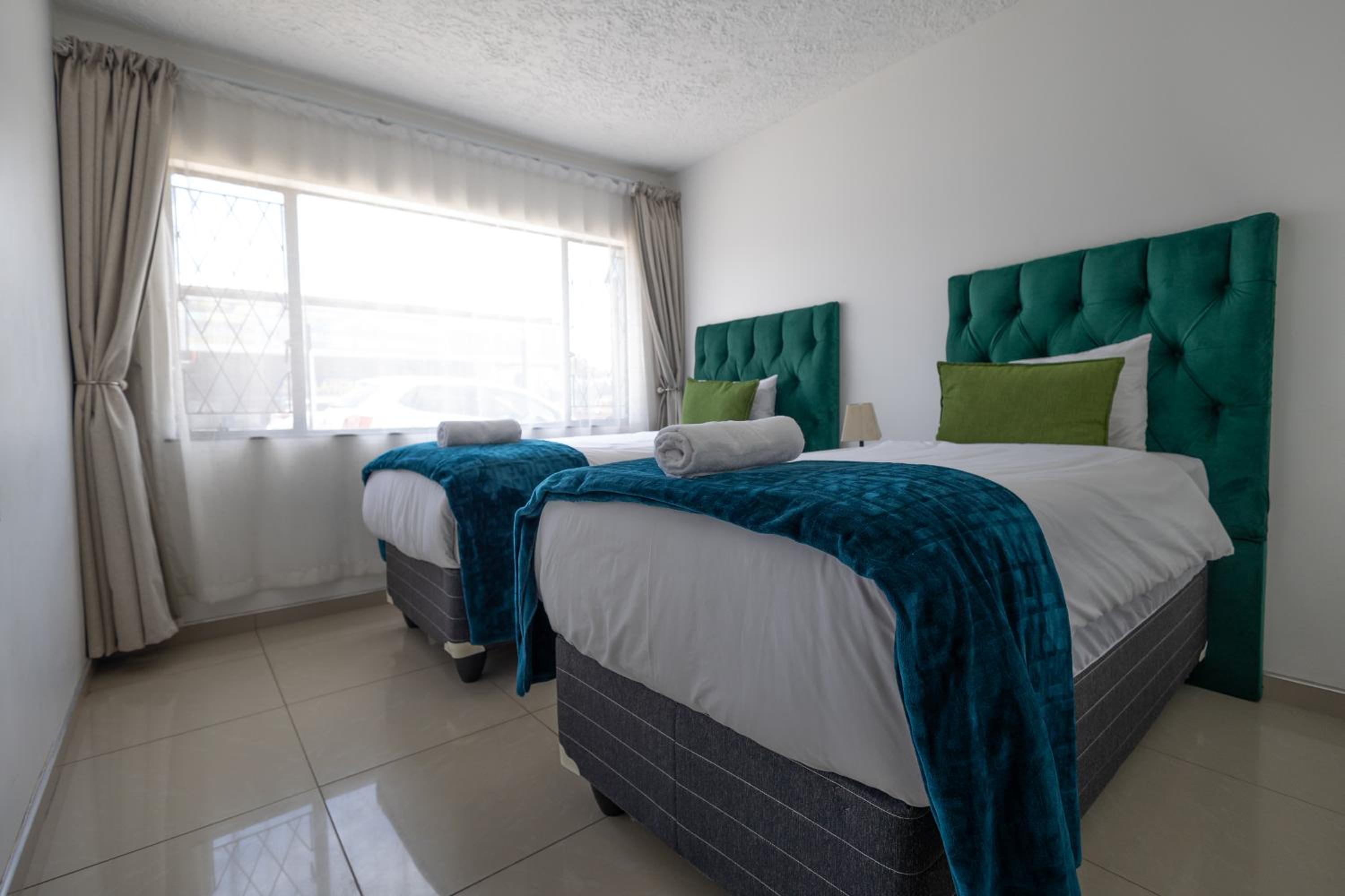 Three-Bedroom Apartment - Photo 3