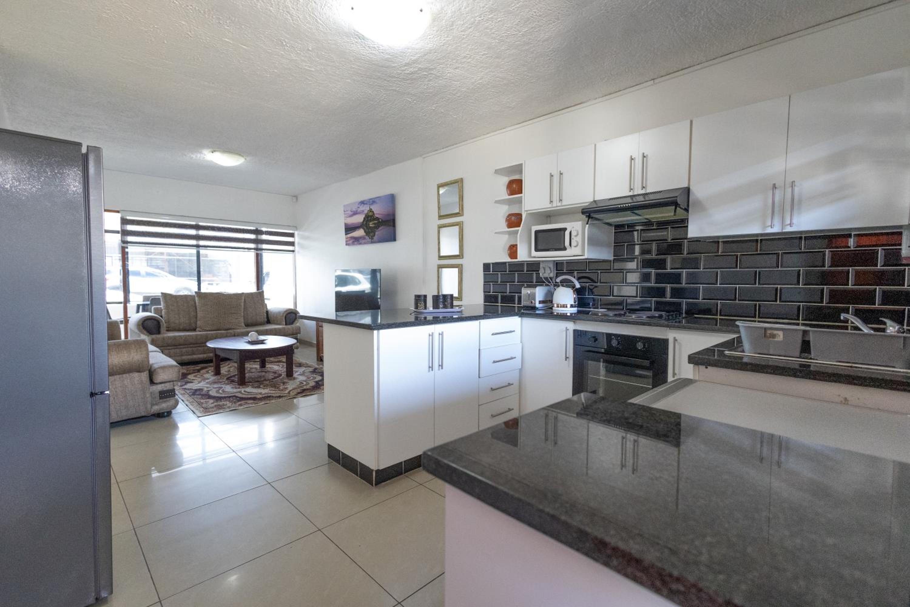 Three-Bedroom Apartment - Photo 8