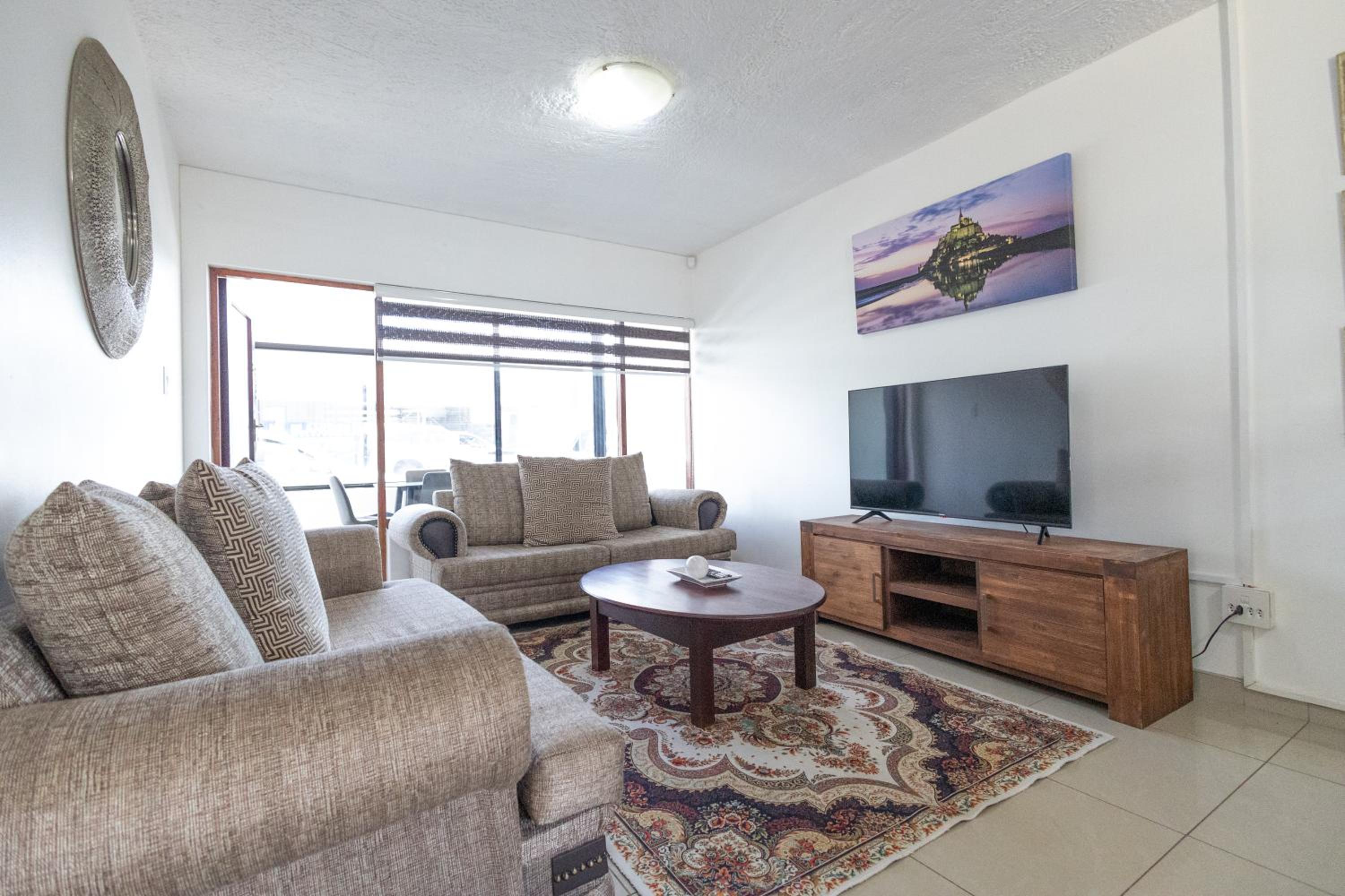 Three-Bedroom Apartment - Photo 1