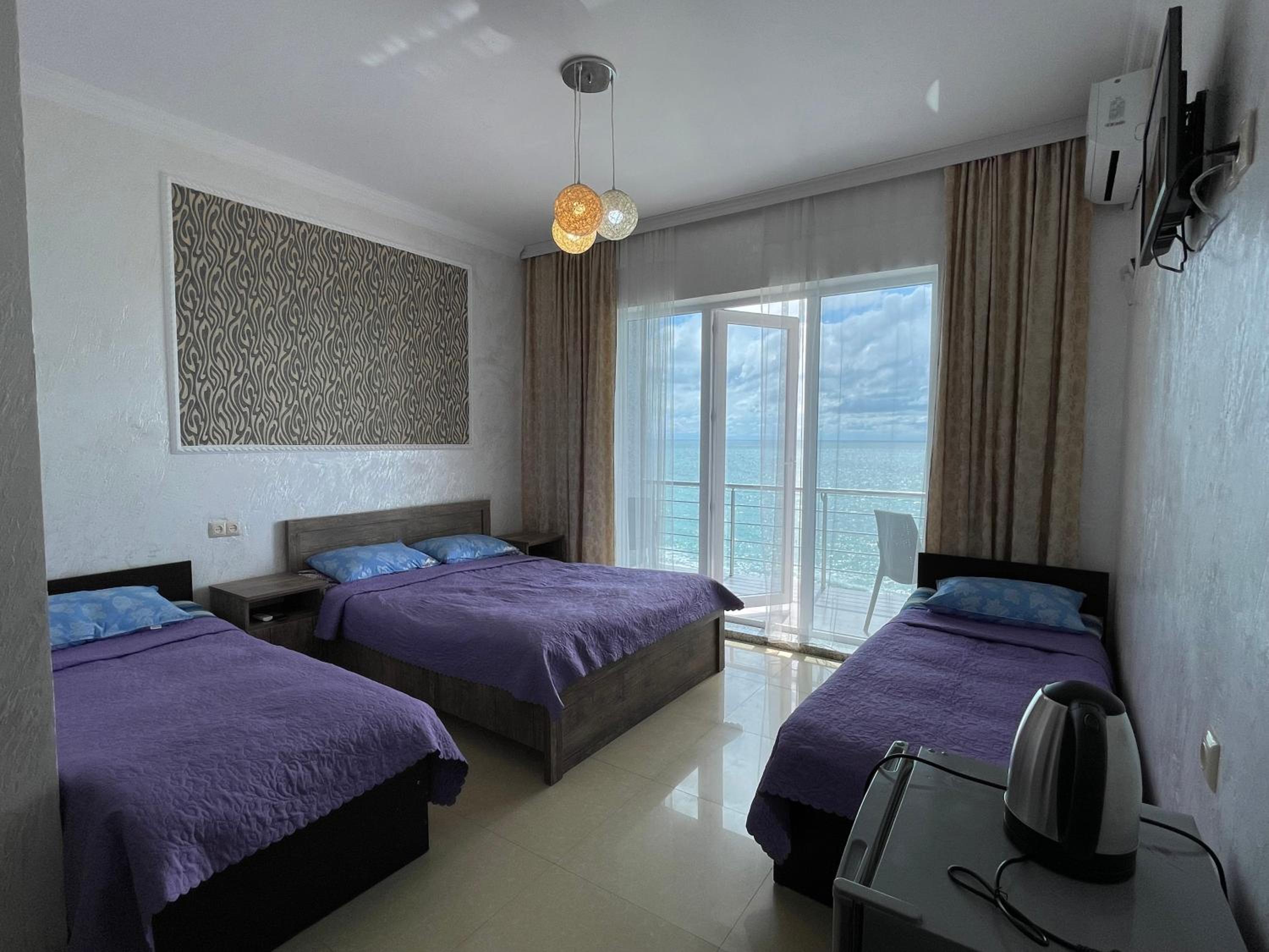 Quadruple Room with Balcony