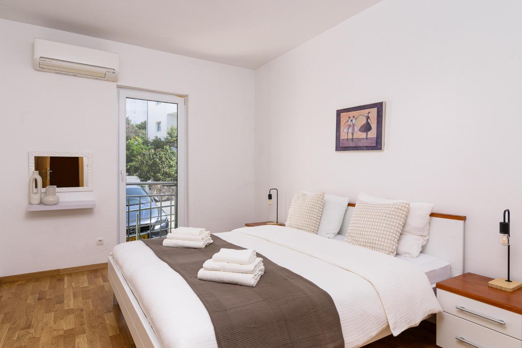 Two-Bedroom Apartment with Balcony and Sea View