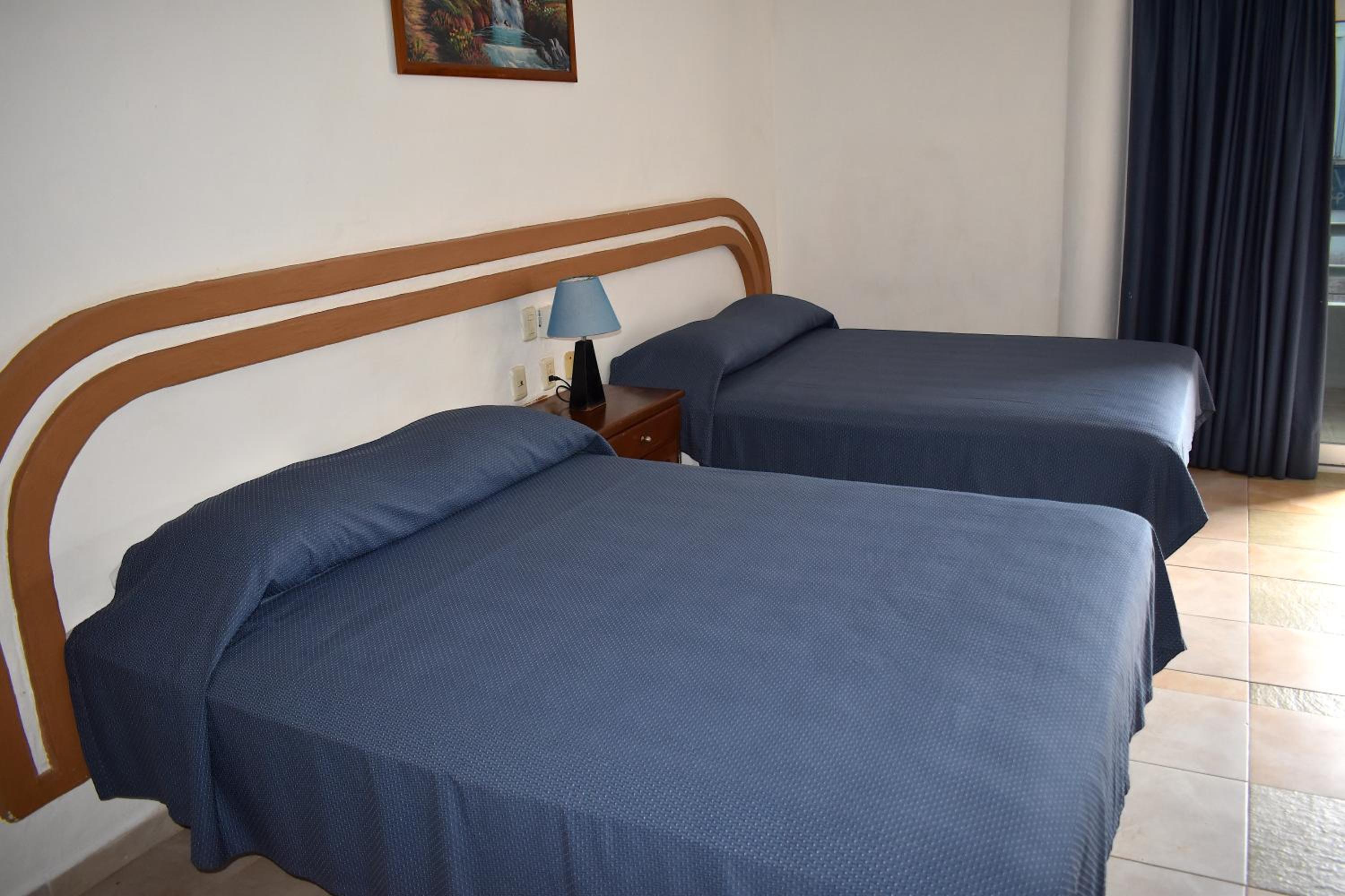 Superior Quadruple Room - Photo 7